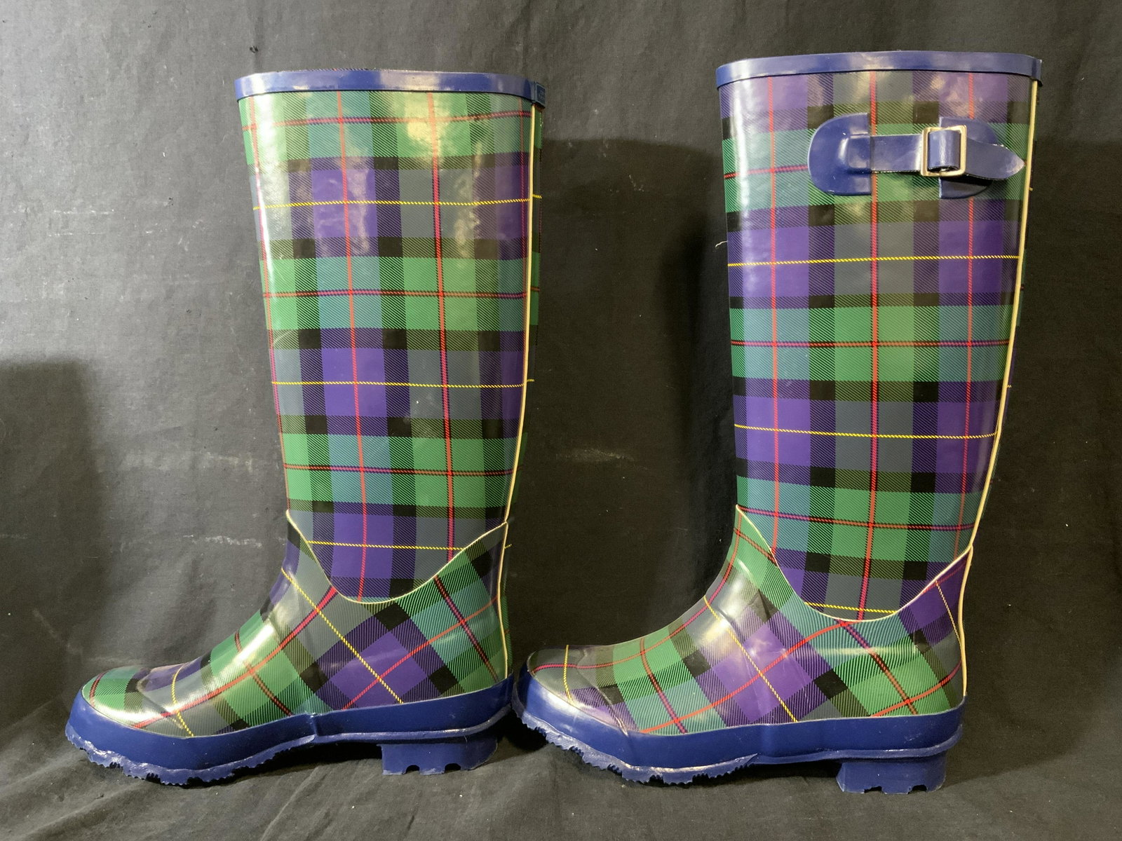 Pair Plaid TAMARA HENRIQUES Rain-boots: Pair of plaid TAMARA HENRIQUES rain boots. Underside reads as TAMARA HENRIQUES 38. Measures approx 15.5 inches H, and 10.25 inches long. Wear is consistent with age and use. This item was generously d