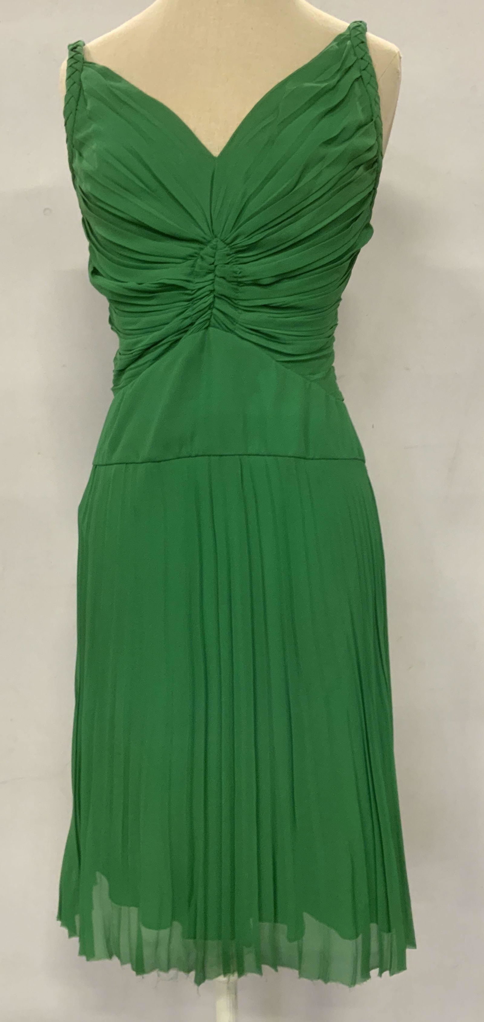 JOY PHILBIN Green Ruched Cocktail Dress: JOY PHILBIN Green Ruched Cocktail Dress, possibly silk, no apparent inscriptions or labels, likely a size 4, a green ruched dress with braided detail and pleated skirt, some fraying to hem and stains