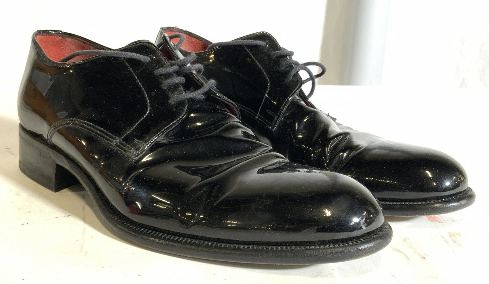 REGIS PHILBIN GORDON RUSH Custom Made Shoes: Interior is signed/marked “MADE EXCLUSIVELY FOR REGIS PHILBIN.? Undersides reads ANTONIO MAURIZI MADE IN ITALY. Shoes are black toned with red interior. Shoes have 1 inch heel. Shoes are size 40. Th