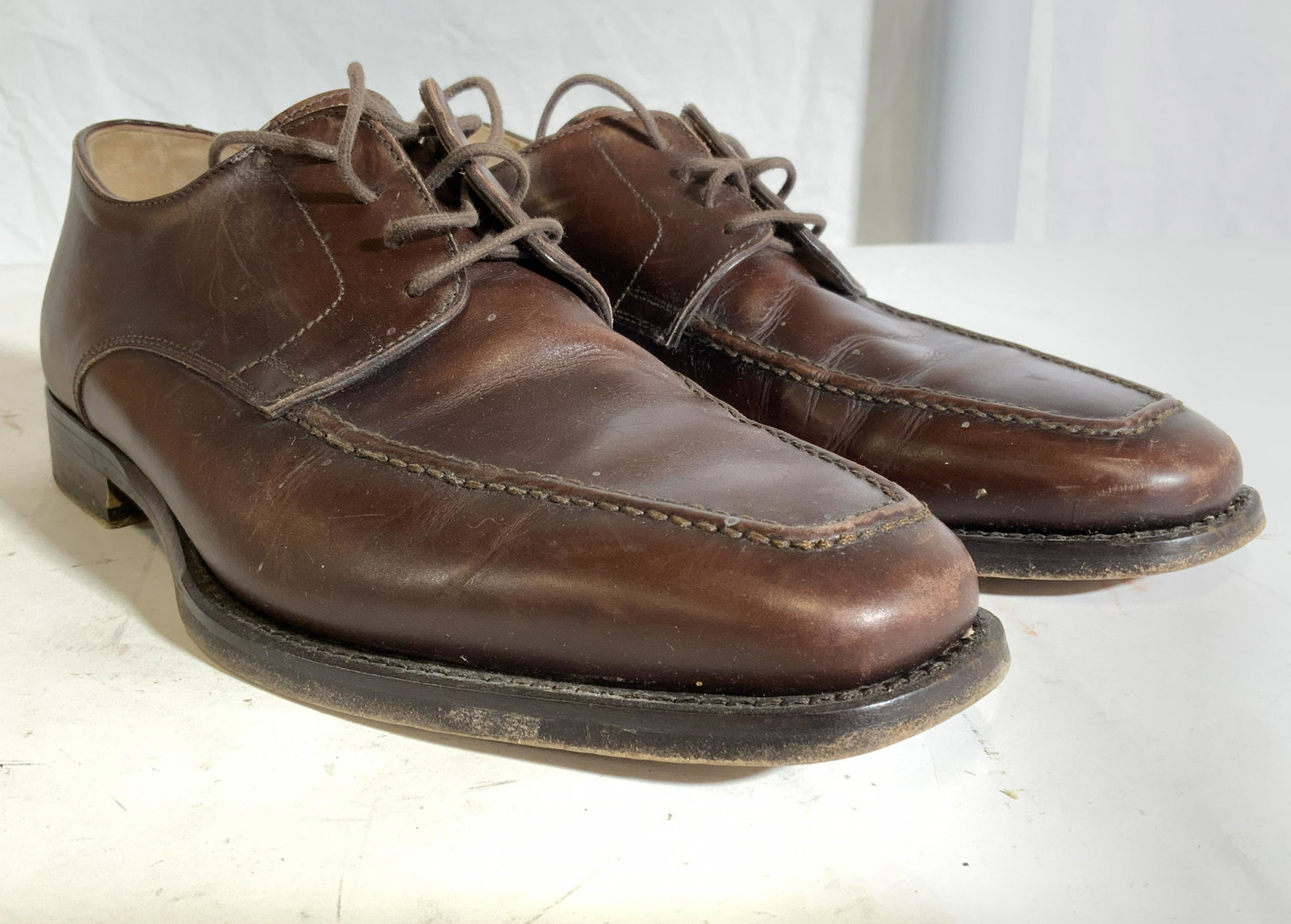 REGIS PHILBIN GORDON RUSH Custom Made Shoes: Interior is signed/marked “MADE EXCLUSIVELY FOR REGIS PHILBIN.? Undersides reads GORDON RUSH MADE IN ITALY. Shoes are brown toned and appear to be genuine leather. Shoes have 1 inch heel. Shoes are 