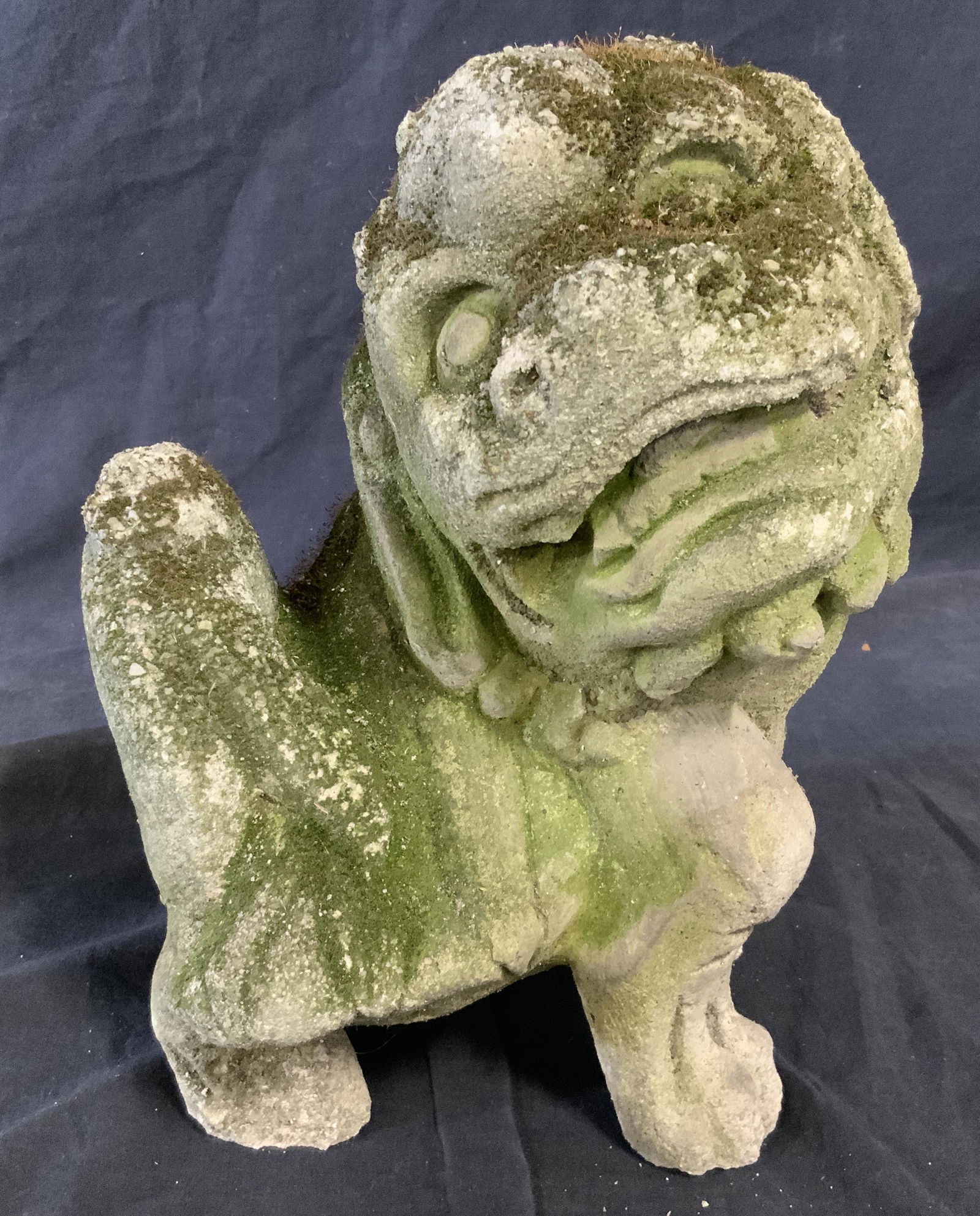 Vintage Garden Stone Foo Dog Statue: Vintage Garden stone foo dog, vintage possibly antique, no apparent inscriptions or markings, subject a foo dog with large head and grinning face, statue measures 12 inches at tallest and 9.5 inches w