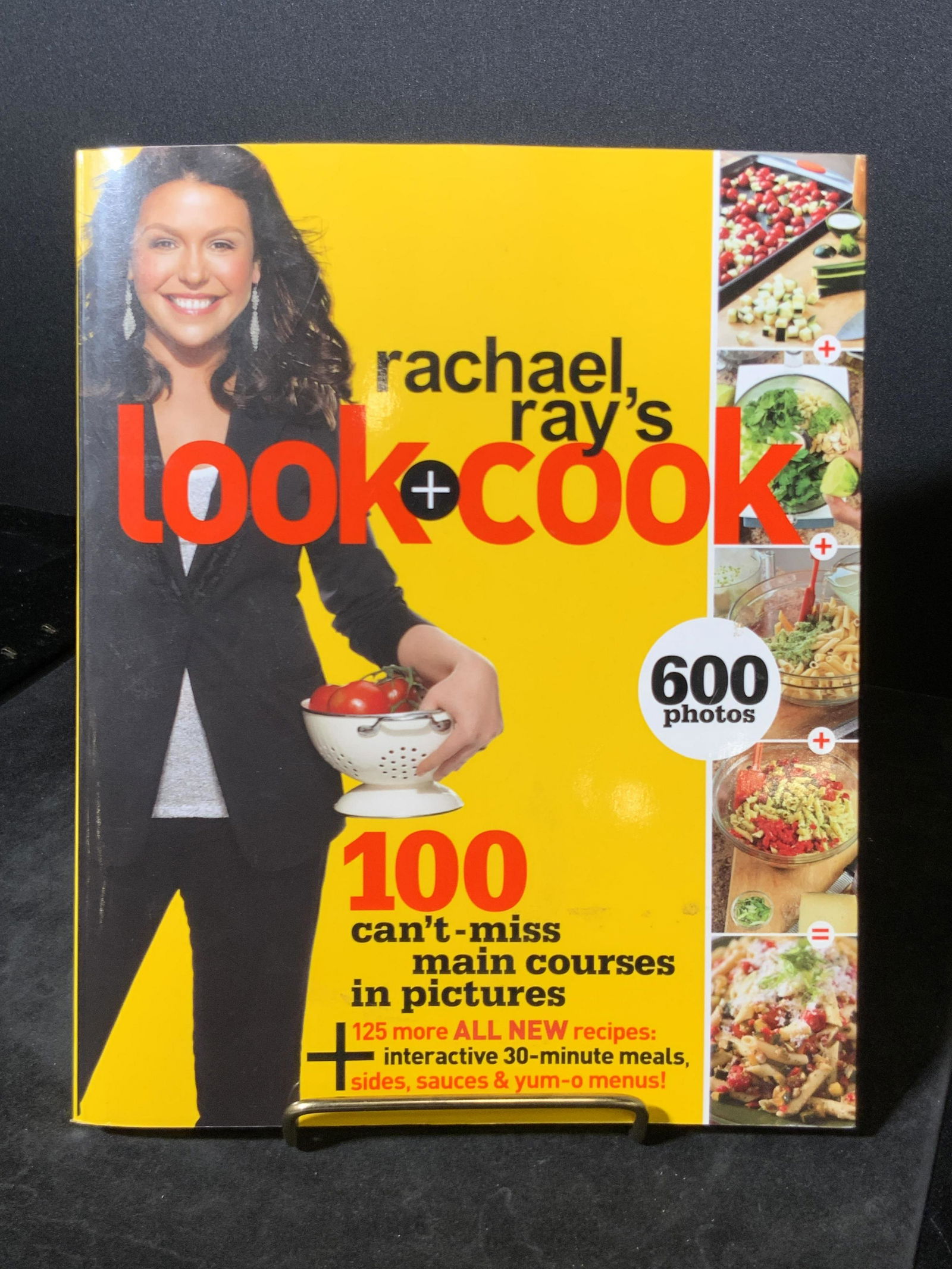 Signed RACHEL RAY to REGIS PHILBIN, Cookbook: A softcover book titled RACHEL RAY’S LOOK + COOK. Interior is signed by Rachel Ray. Signature reads: ‘For Joy & Regis, I hope this book brings you joy. Love & smooches xx Rachel Ray. 10/26/10.’.