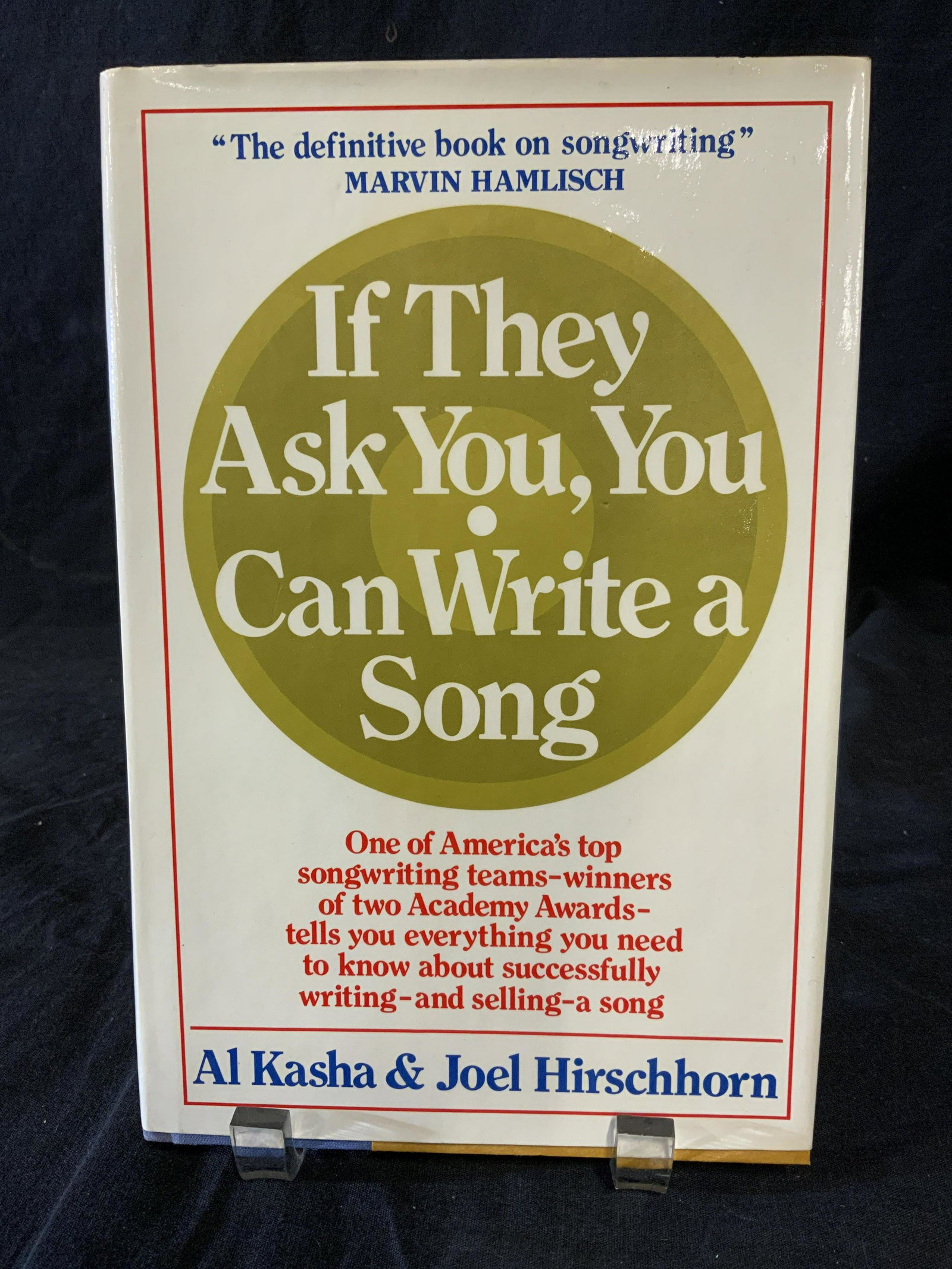 Signed AL KASHA & JOEL HIRSCHHORN to REGIS, Book: A hardcover book titled IF THEY ASK YOU, YOU CAN WRITE A SONG Written by AL KASHA & JOEL HIRSCHHORN. Interior is signed by both authors. Signature reads: ‘To Regis, best wishes, al kasha, Joel HIRSC