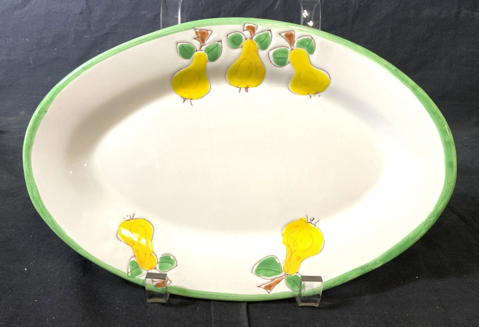 Signed Hand Painted Oval Ceramic Dish: Underside is signed illegibly. Piece is hand painted. Appears to be painted with lemon and leaf detail. Piece measures approx 11 inches long 7 inches deep. Signed ceramic, hand painted ceramics, vinta