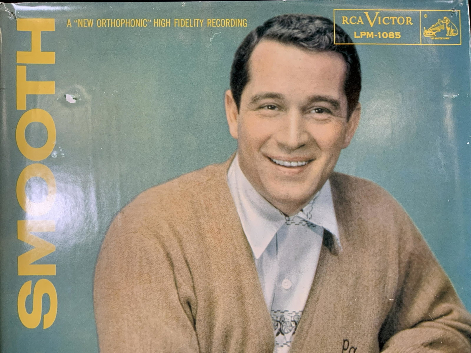 Perry Como So Smooth Album Cover: Perry Como So Smooth Album Cover, inscriptions read ‘So Smooth A New Orthophonic High Fidelity Recording RCA Victor LPM-1085’, measures 19 7/8 x 19 7/8 inches, some losses to piece and holes, not 