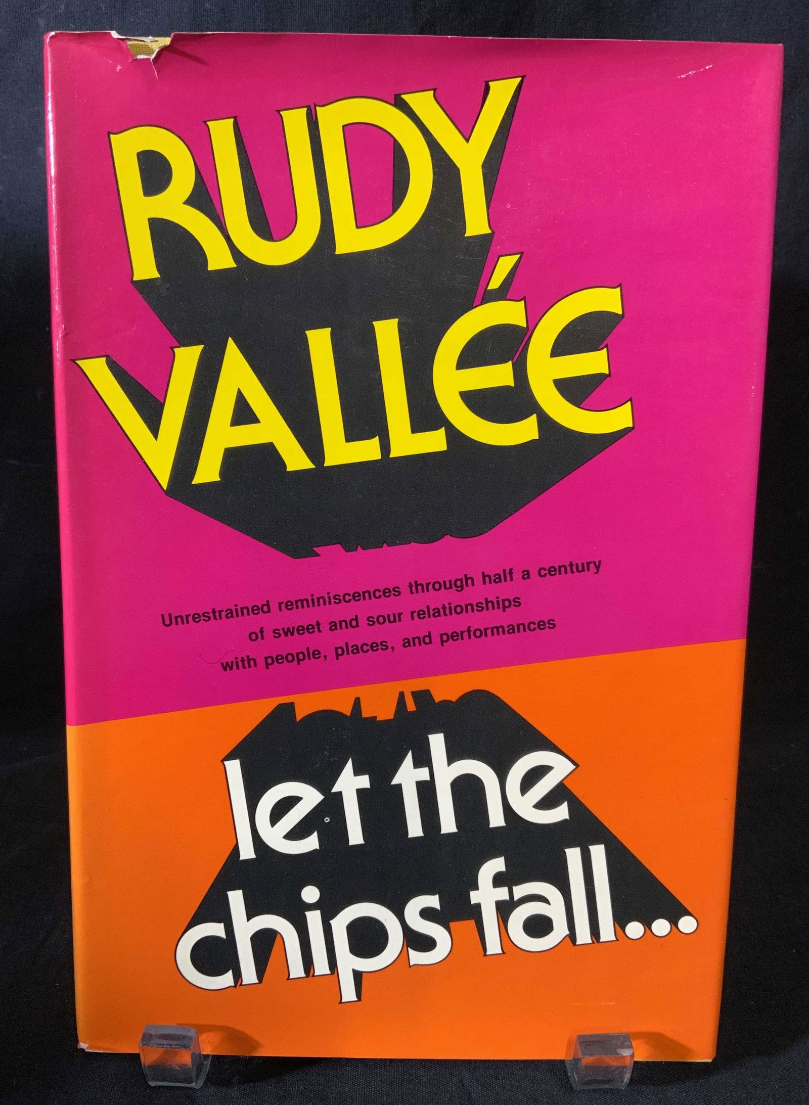 Signed RUDY VALLÉE To REGIS PHILBIN, Book: Signed Rudy Vallée Coffee Table Book, signatures read as ‘To Regis The PHILBIN, Rudy VALLÉE, God Damn it! Read all of it and learn something 7/28/81. Measures approx 9.5 inches H x 6.25 inches W,