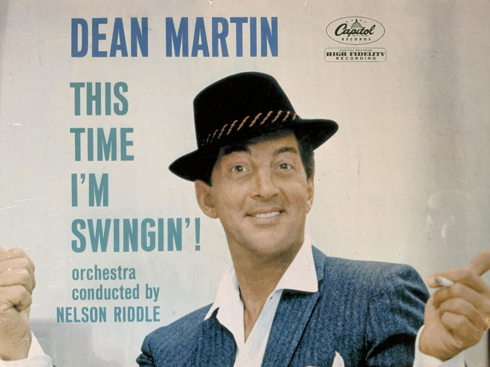 Dean Martin This Time I’m Swinging Album Cover: Dean Martin This Time I’m Swinging Album Cover, inscription reads ‘Dean Martin This Time I’m Swinging orchestra conducted by Nelson Riddle Capitol Records High Fidelity Recording’, measures 19