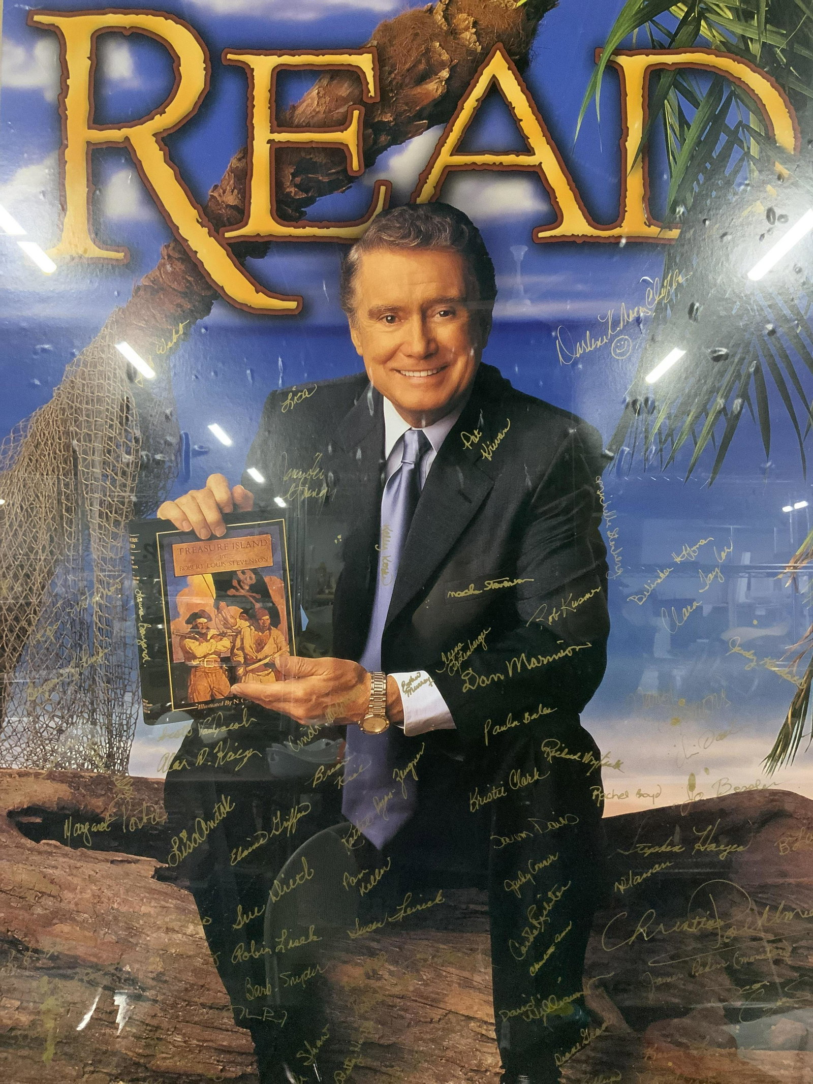 REGIS PHILBIN Signed Read Poster: REGIS PHILBIN Signed Read Poster, unclear who signatures belong to, measures 39 5/8 x 27 7/8 inches, gold toned metal frame, surface wear to frame, professionally framed and double matted in beige, cr