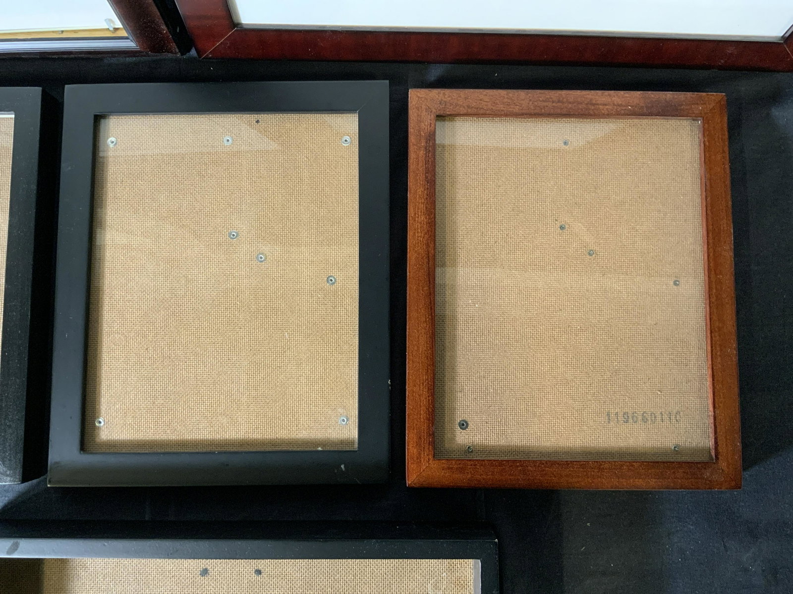 Lot 6 Wooden Picture Frames: Lot 6 Wooden Picture Frames, inscriptions read ‘Made in Thailand’ and ‘Made in Italy’, smallest frame measures 11 x 9 inches, largest frame measures 23 7/8 x 16 3/4 inches, surface wear to som