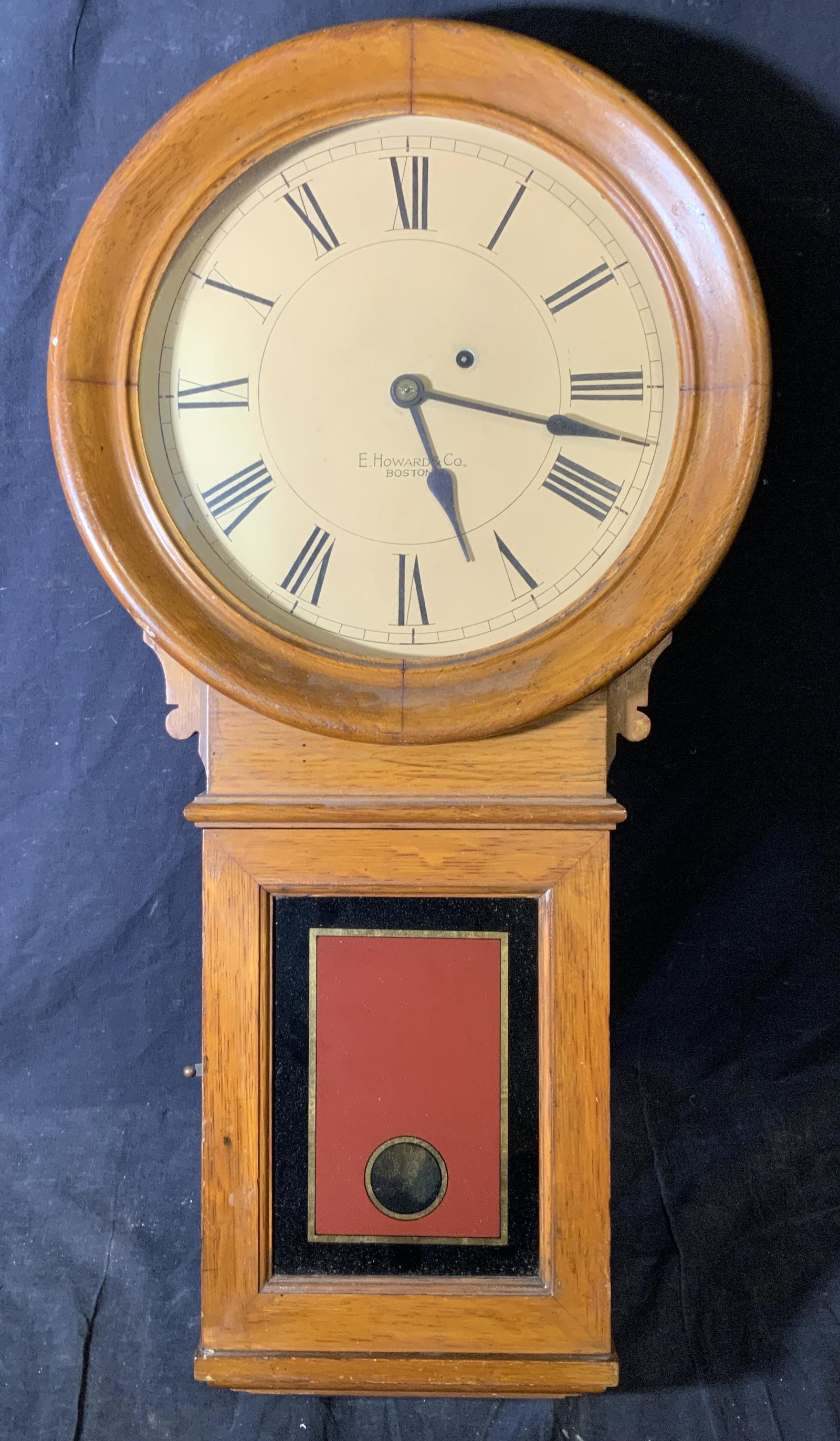 E.Howard & Co. Pendulum Wall Clock: E.Howard & Co. Pendulum wall clock, face of clock reads ‘E.Howard & Co. Boston’, wire to internal workings snapped needs repair, loose piece to internal workings, piece includes a weight that read