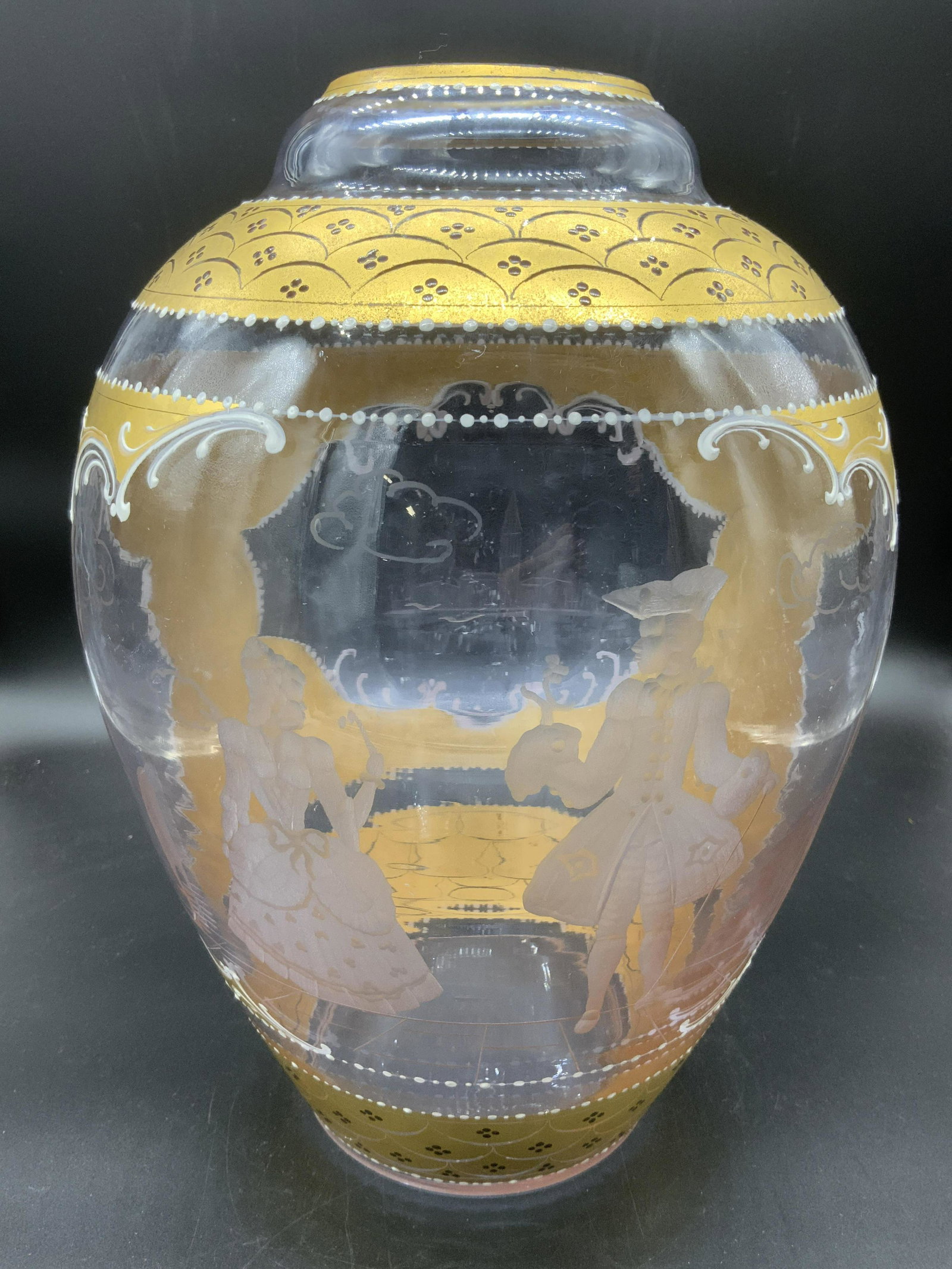 Gilt Engraved French Style Vase: Gilt Engraved French Style Vase, no apparent inscriptions or marks, design features an engraved set of buildings and a couple, measures 12 2/4 inches tall x 4 7/8 inches wide at base, surface west to 