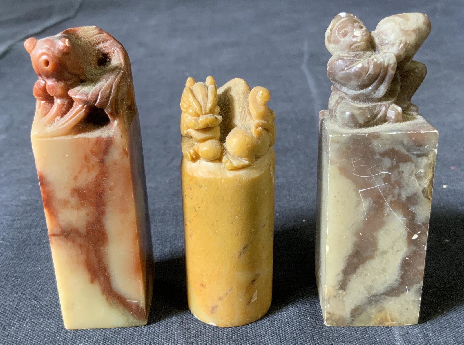 Lot 3 Chinese Stone Seals: Lot 3 Chinese Stone Seals, no apparent inscriptions or marks, shortest measures 2 1/4 inches long, tallest measures 2 3/4 inches long , some chips to stone and surface wear, Chinese Decorative arts, A