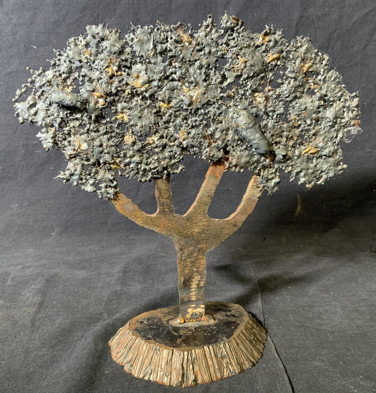 Mixed Metal Tree Sculpture Artwork: Mixed metal tree sculpture, text to underside reads ‘MJS 10-02’, piece possibly made of various mixed metals, body and base potentially made of cut iron or steel, piece measures approximately 10 i