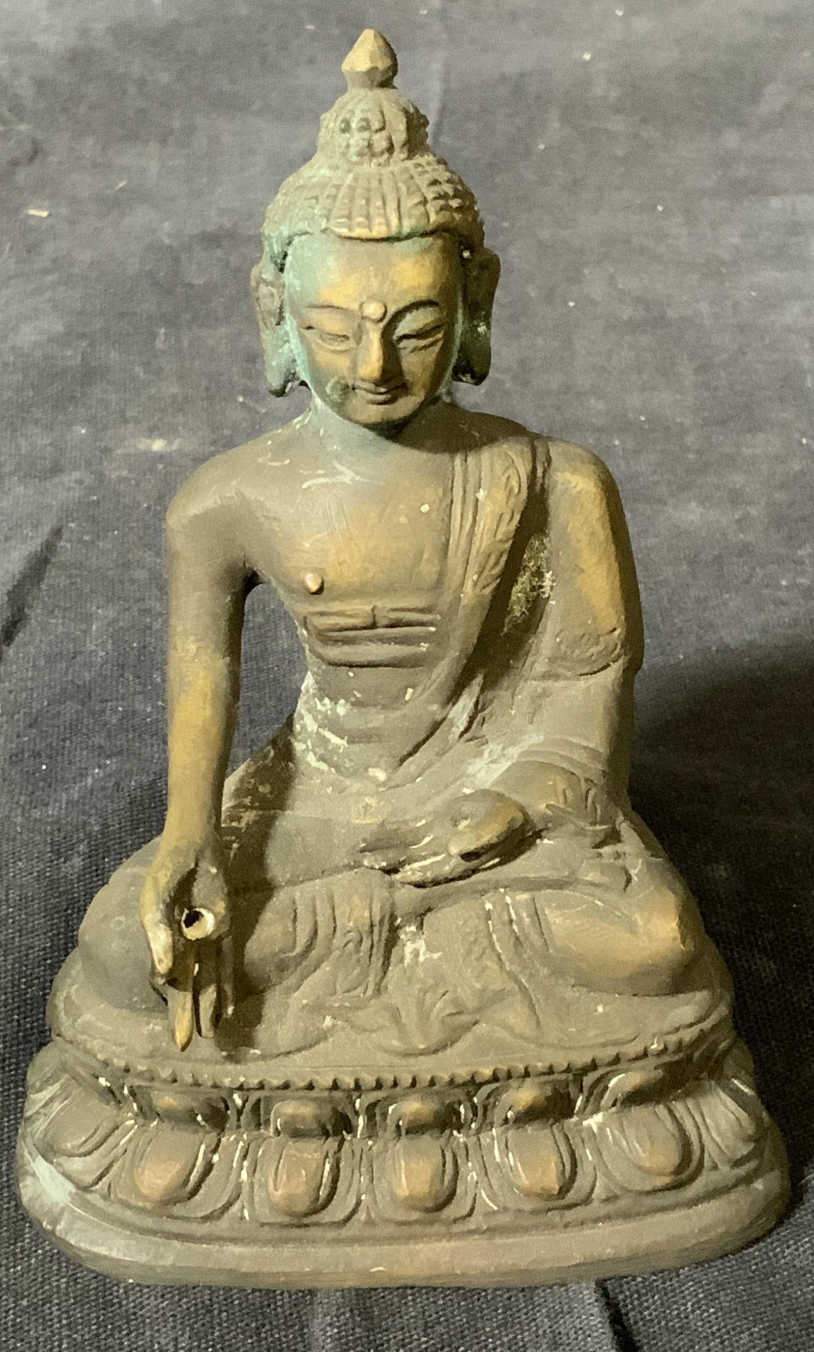 Bronze Miniature Buddha Figural: Bronze Miniature Buddha figural, no apparent inscriptions or markings, underside of hollow body shows massive oxidation, chips and oxidation to exterior, piece measures 3.5 inches at tallest point, Br