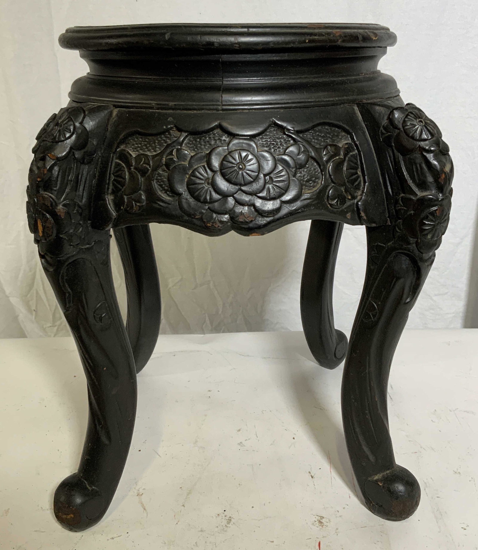 Hand Carved Wooden Asian Plant Stand: Possibly Japanese (three clawed dragon), possibly Meiji Period export furniture, possibly circa 1880 - 1920. Hand carved wooden Asian plant stand, scene to top displays a dragon, no apparent labels or