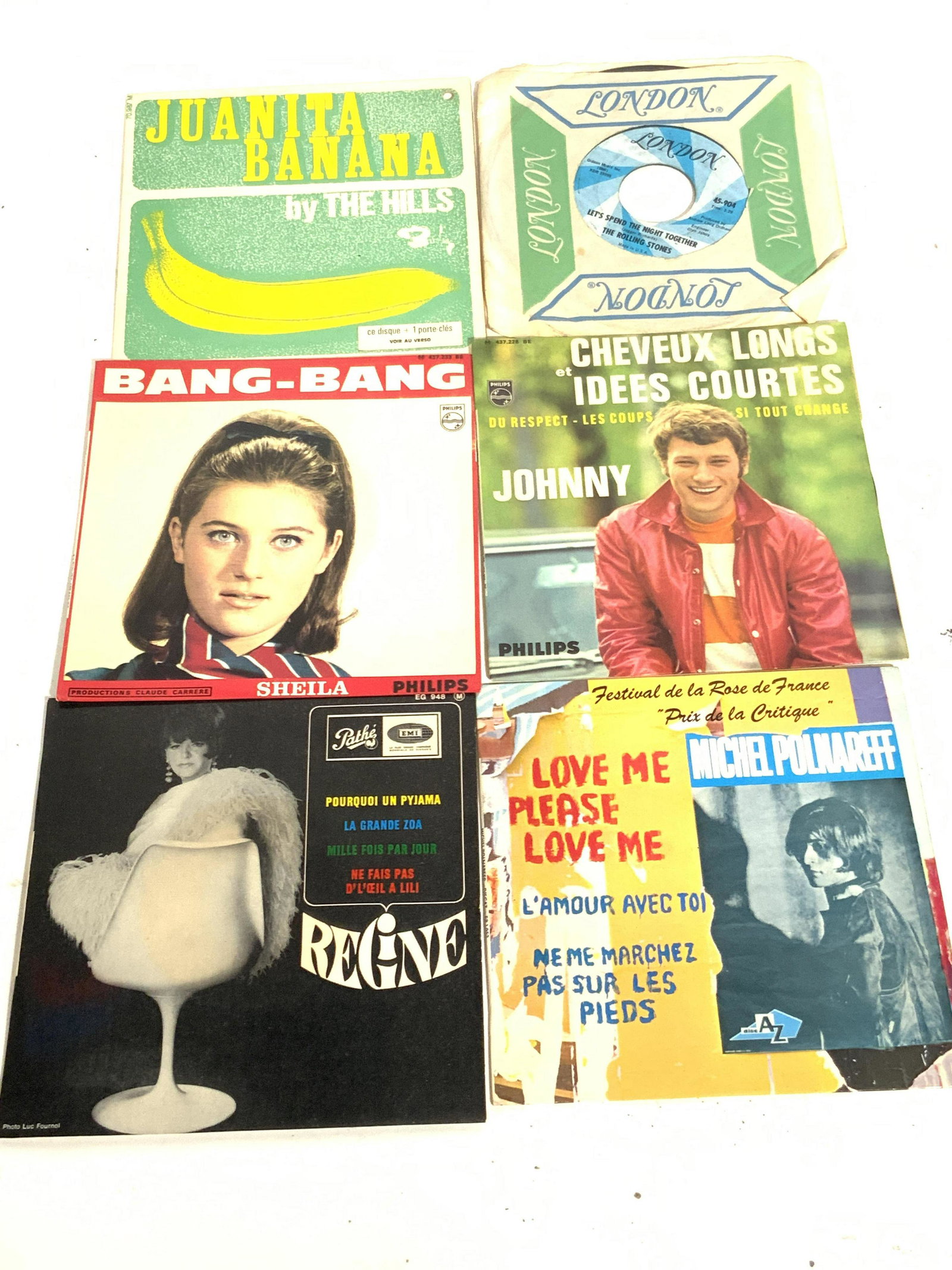Lot 6 Vinyl 45 Records, THE ROLLING STONES & More: Six vinyl 45 records. Pieces appear to be contained in their original packaging. Some pieces are vintage. Lot includes, The Rolling Stones, Regine, Sheila, Michel Polnareff, Johnny Hallyday, T. Howard