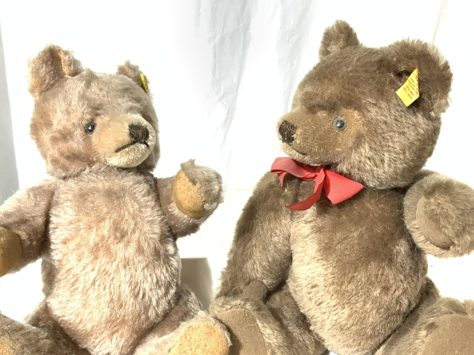 Collectible Vntg Pair STEIFF TEDDY BEARS, Austria: Wool and Cotton combo plush stuffed bears, a collectible STEIFF stuffed bear toy, vintage, attached tag to bears’ ear ( both have number 0202/36) made in Austria, movable arms and legs and rotating 
