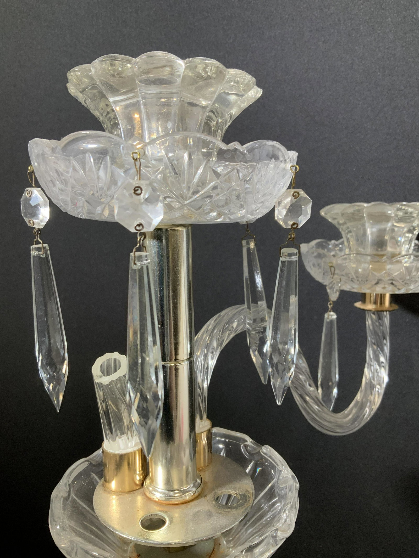 Ribbed Glass Standing Table Candelabra: Vintage piece with two curved arms, note one arm is severed and needs repair. Dangling prisms from cut glass Boucher cups. Total 13 pointed prism icicles. Many parts to be up cycled if desired, yet re