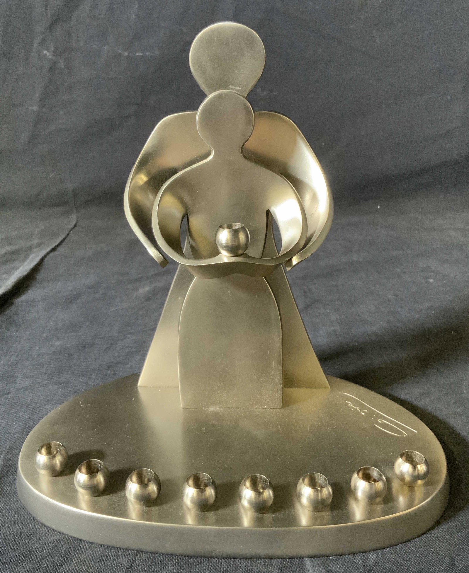 Marked Metal Menorah with Abstract Figures: Marked Metal Menorah with Abstract Figures, inscription to base illegible, measures 7 3/4 inches tall x 7 3/8 inches wide at base, some surface wear to piece, Menorah, judaica, Judaism, holiday access