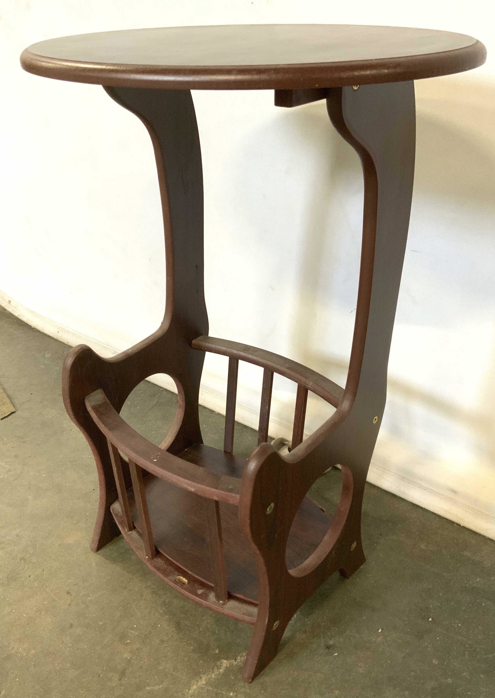 Wooden Side Table: Wooden side table, table top is oval shaped, slats and shelf on base need to be reattached, some slats missing. Measures approx 21.75 inches H, and 14.25 inches W. Wear is consistent with age and use.