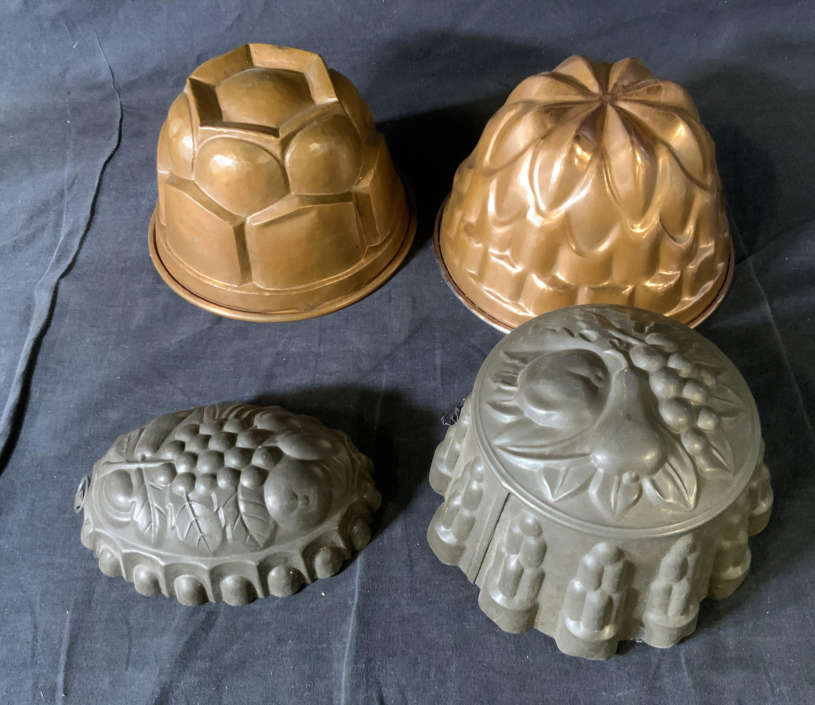 Lot 4 Vintage Jello Molds: Lot 4 Vintage Jello Molds, no apparent inscriptions or marks, smallest mold measures 2 inches tall x 6 1/4 inches at widest point, largest mold measures 4 1/2 inches tall x 7 5/8 inches in diameter, s