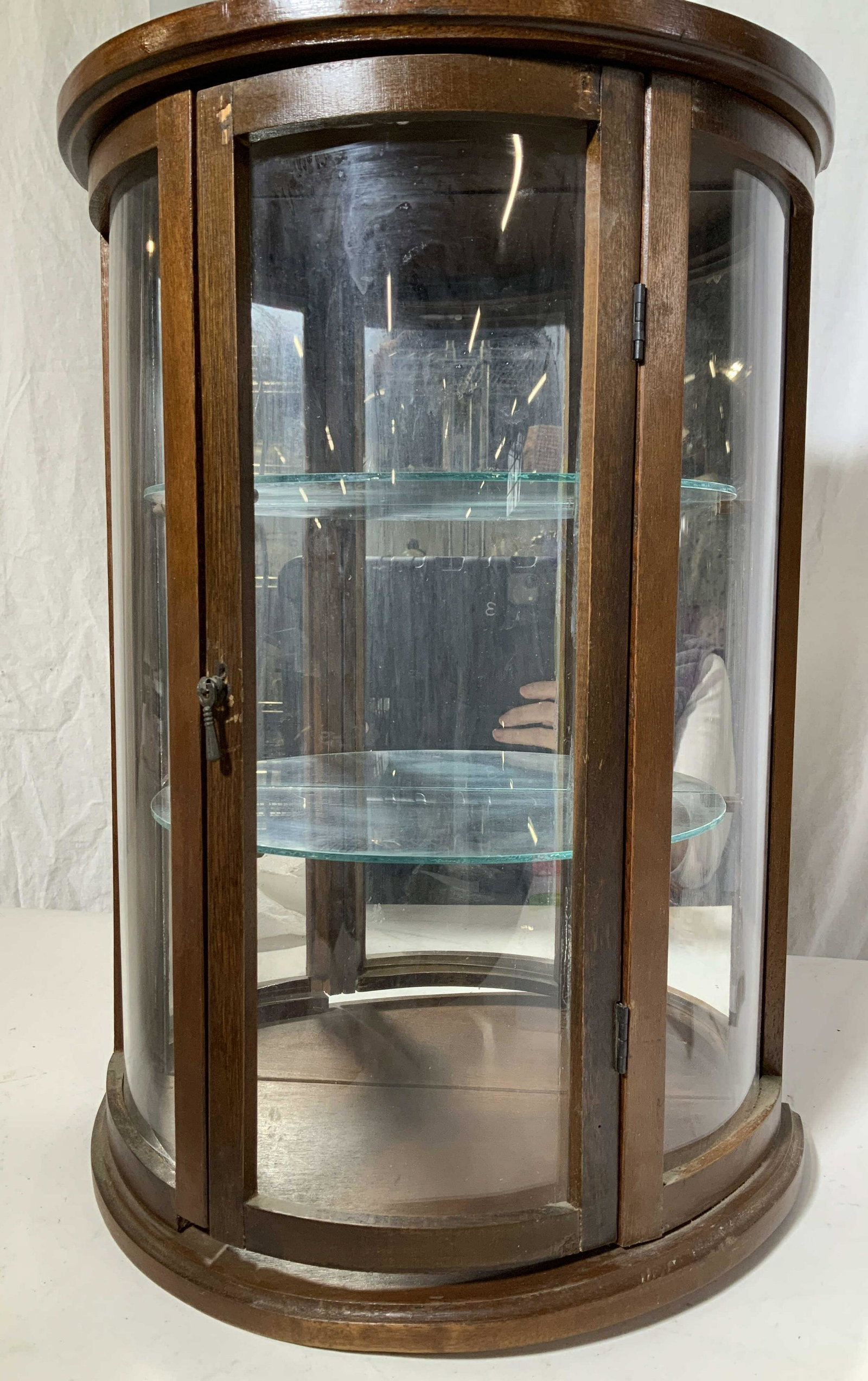 Vintage Oak Wall Curio Backside Mirror: Vintage small furnishings, Half circular Wood Wall Cabinet, possibly oak, for display items. Upper Victorian detail with attached hanging hardware. Interior backside mirror, hinged door opening with p