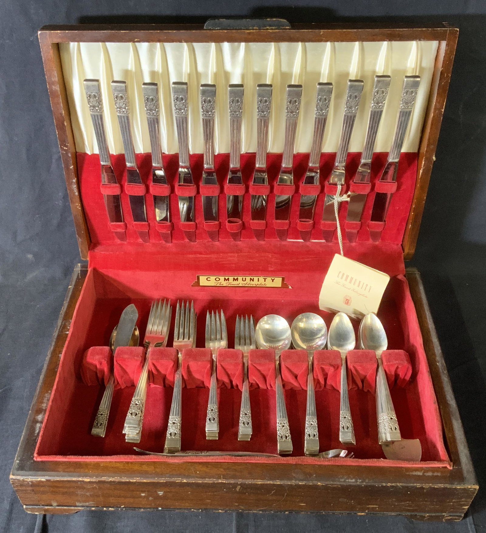 Set 71 COMMUNITY Silverplated Flatware: Set 71 COMMUNITY Silverplated Flatware, inscriptions read ‘Community’ and ‘Stainless’, knives measure 9 3/8 inches long, serving fork and spoon measure 9 inches long, smallest spoons measure 6