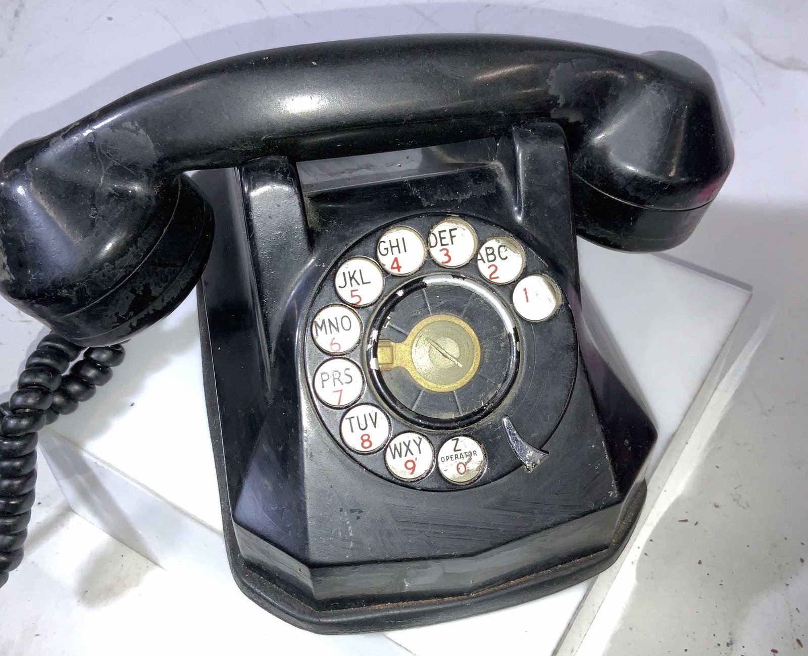 BAKELITE MONOPHONE Rotary Telephone, 1940s Coll.: Vintage AE40 Rotary Monophone Telephone, Black Bakelite, Automatic Electric (c.1940s), has partial ID Label on underside. The phone includes the original handset, which is still attached by the origin