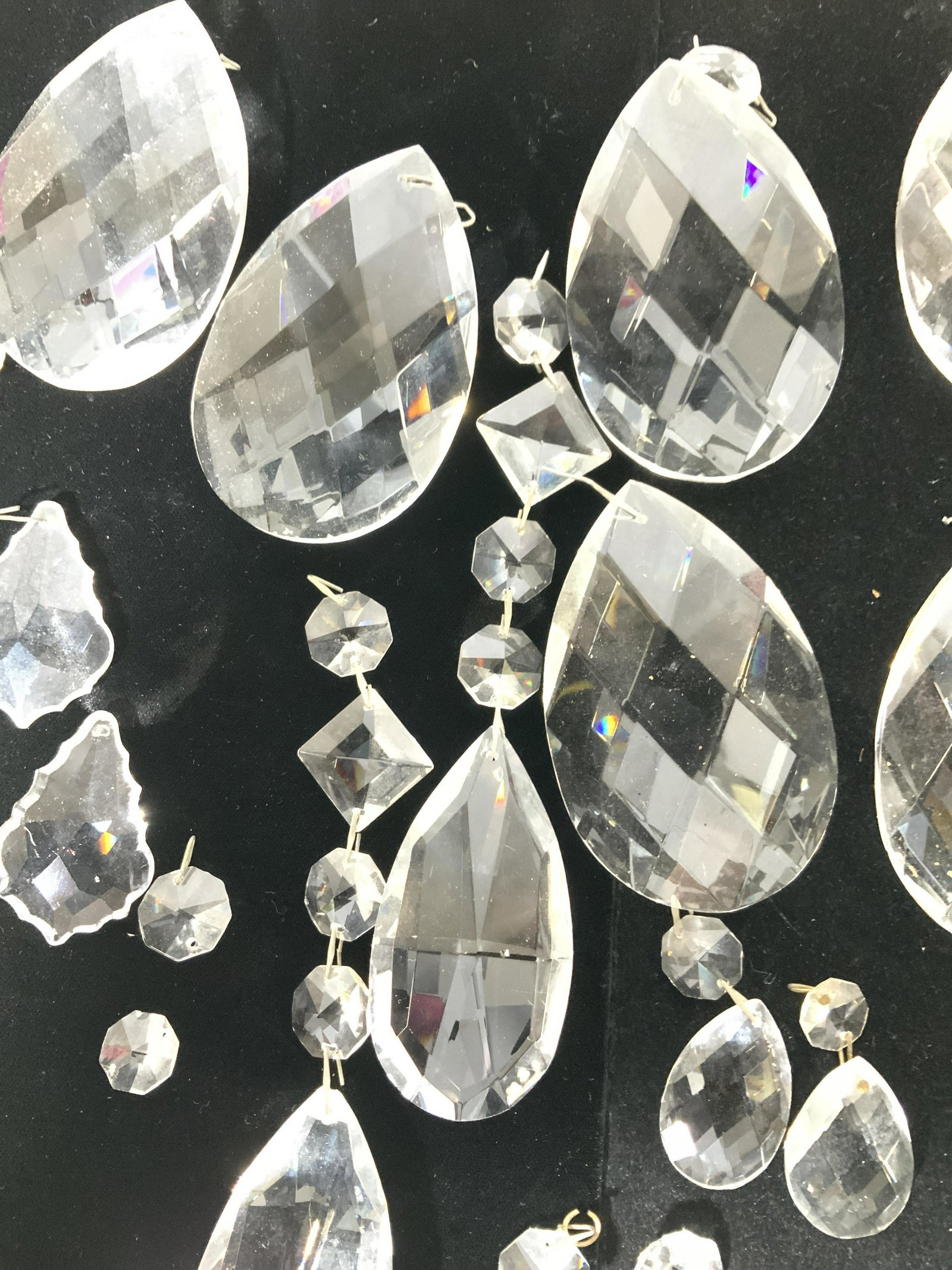 Set 7 Large Chandelier Teardrop Prisms, more: Collections of faceted glass or acrylic chandelier prisms to decorate to a chandelier you already own, add to a candelabra, use for other home decor or arts and crafts. 7 large 3.5 x 2.25 in. cut Diam