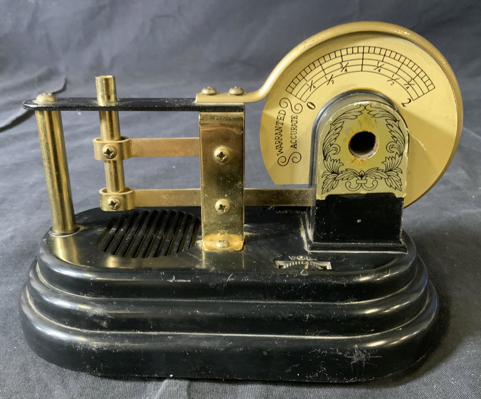 Vintage Tuning Instrument, Japan: Vintage Tuning Instrument, Japan, inscriptions read ‘Tuning’, ‘Vol’, ‘Made in Japan’, original purpose unknown, measures 4 5/8 inches tall x 6 3/8 inches at widest point, surface wear to p