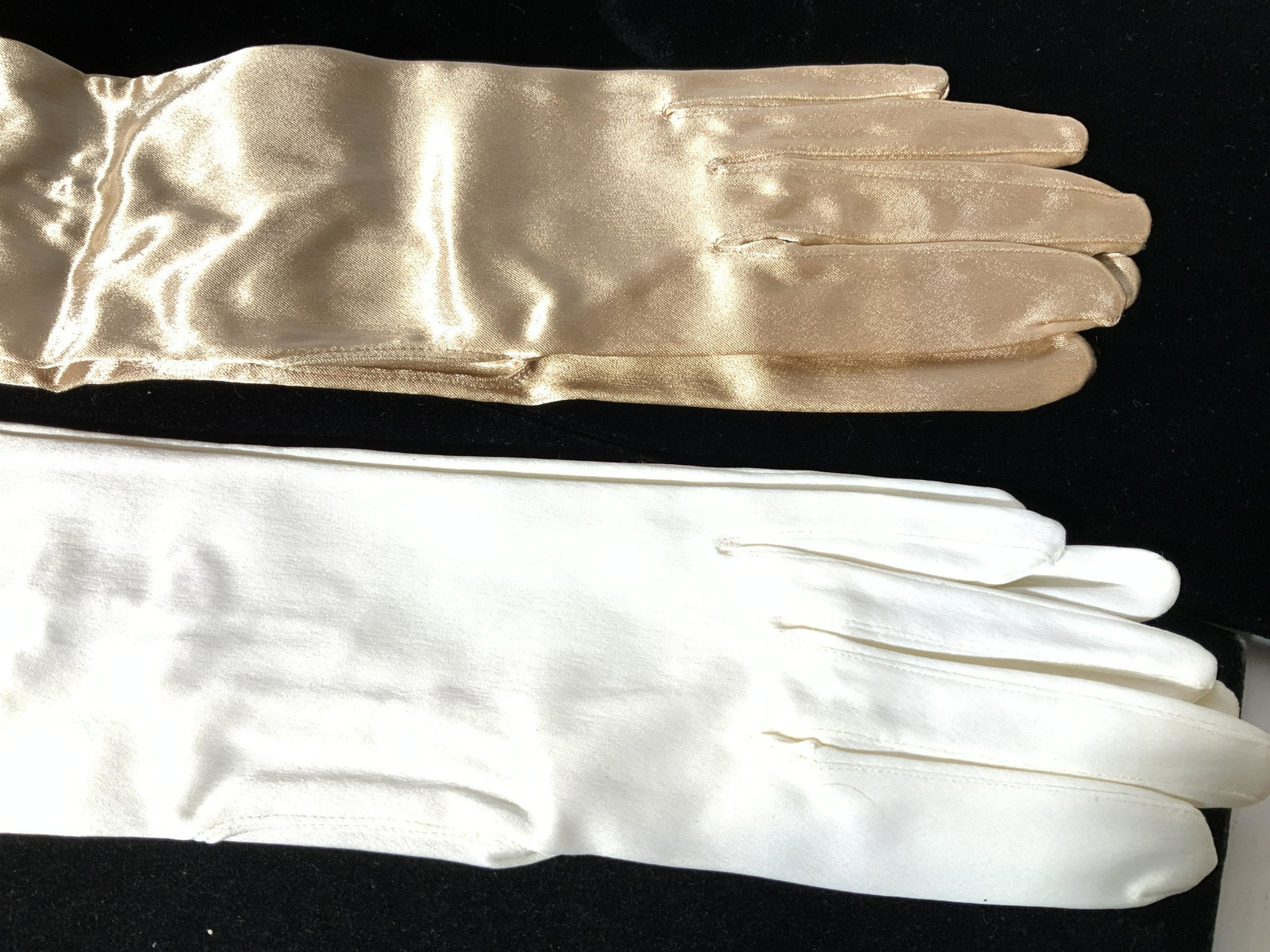 Lot Ladies Vntg Fashion Gloves, Gant Nyeret Paris: 8 pairs of ladies vintage , c. 1940s, fashion satin gloves. Pairs new in package, including 2 pairs GANT NEYRET PARIS SATIN ELBOW GLOVES IN WHITE AND IN GOLD, both with a bit of stretch , size small, 