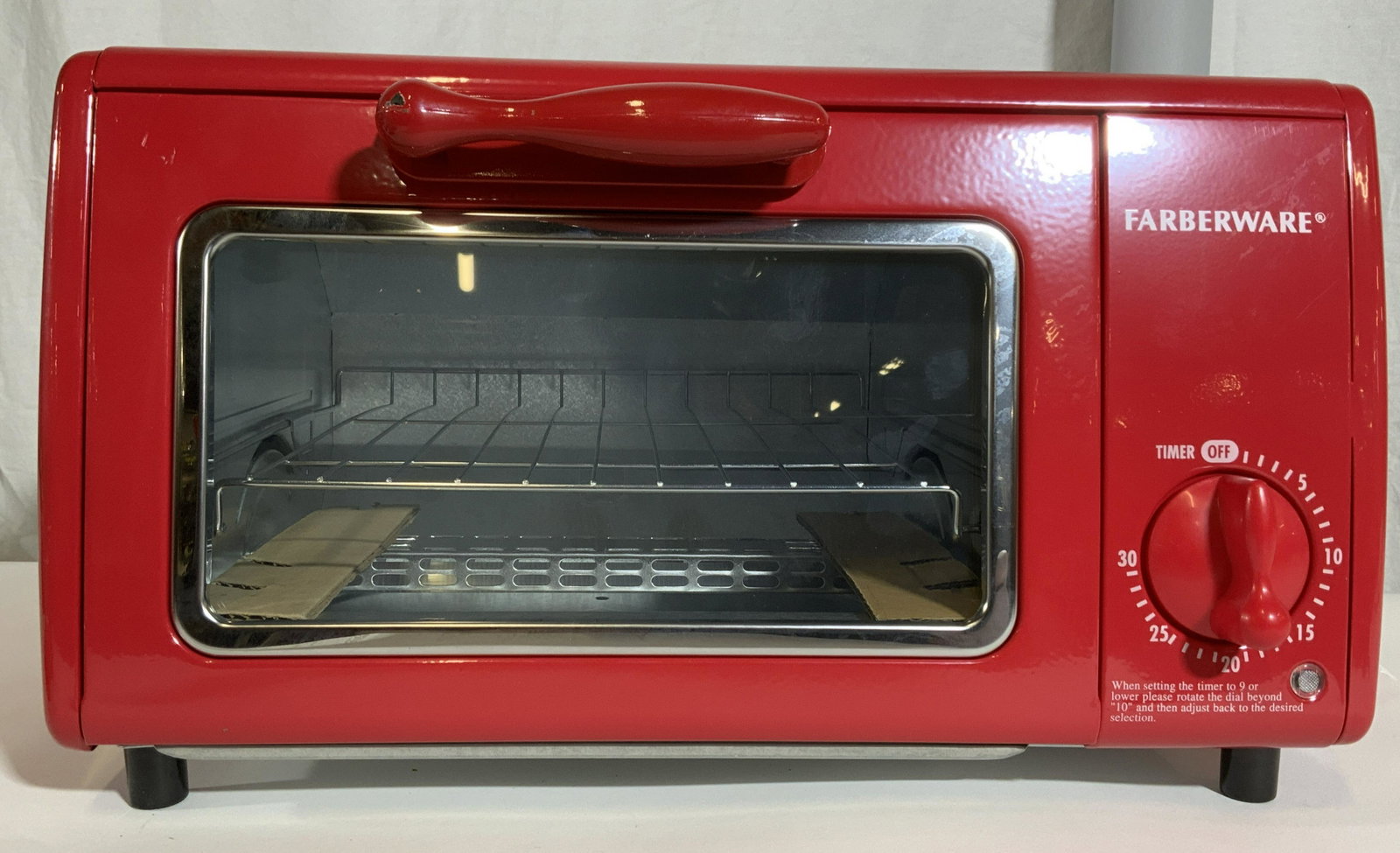 FARBERWARE Toaster Oven: FARBERWARE toaster oven,Measures approx 8.75 inches H, and 15.25 inches W. Property of a multigenerational Brooklyn collectors estate. Toaster oven, oven, kitchen accessories, cooking tools, kitchenal
