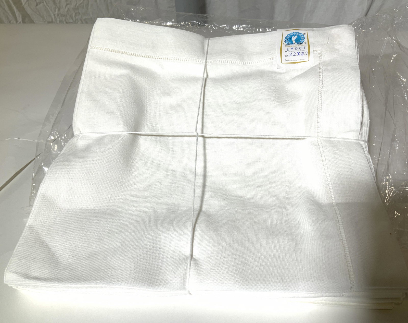 White Chinese Linen table Napkins, 12: Vintage Linen Dinner napkins, never used, with original tag wrapped in original string and original cellophane bag, bright crisp white, 22x x 22 in. 100% linen, Made in China , labeled Clever Fingers,