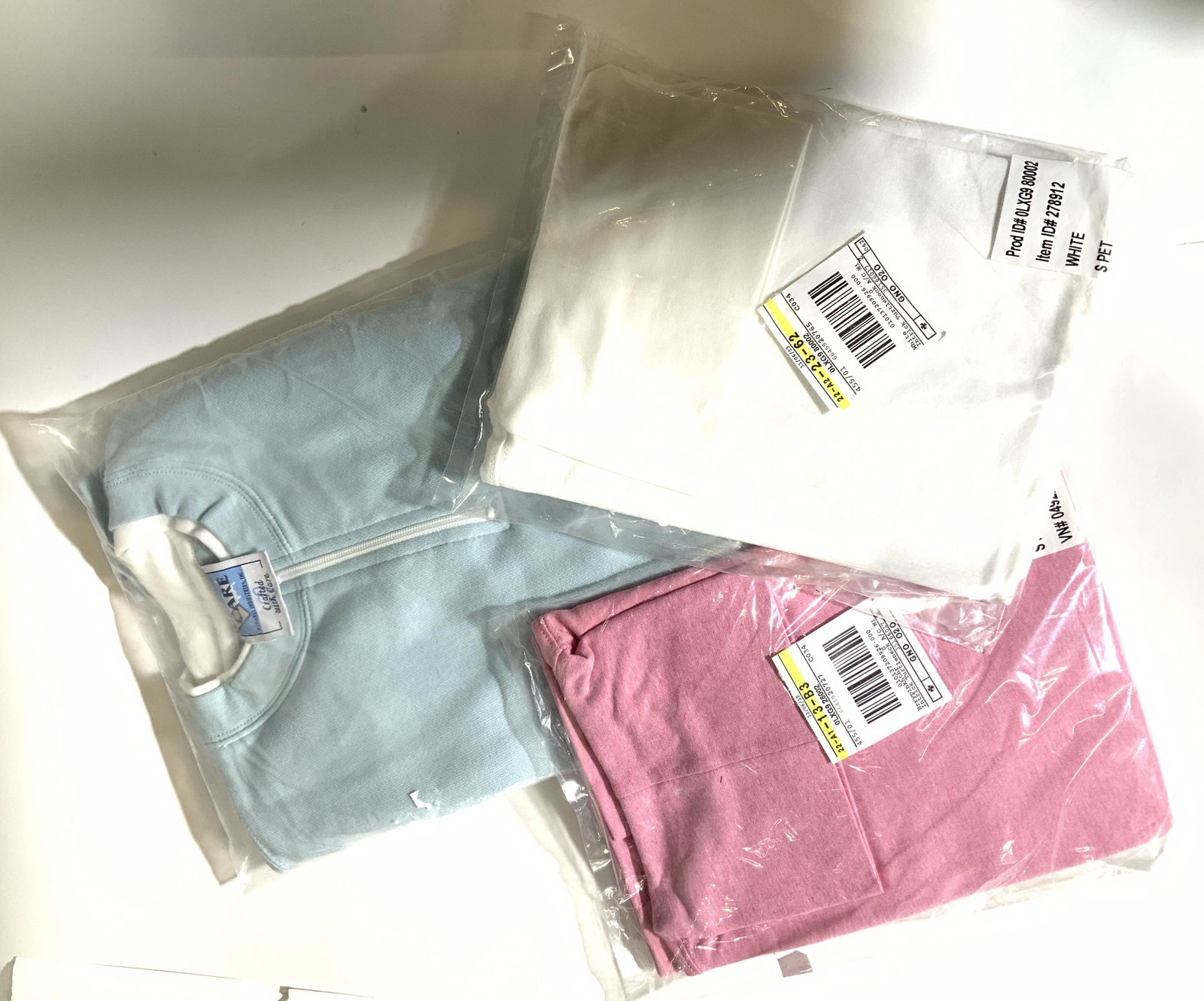 L.L.BEAN TURTLENECKS, Sweatshirt, Ladies: All ladies tops, never opened in original package with labeled sticker. Two LL Bean ladies turtlenecks , size Small Petite in Pink Heather and White. Light blue sweatshirt with crew neck and quarter z