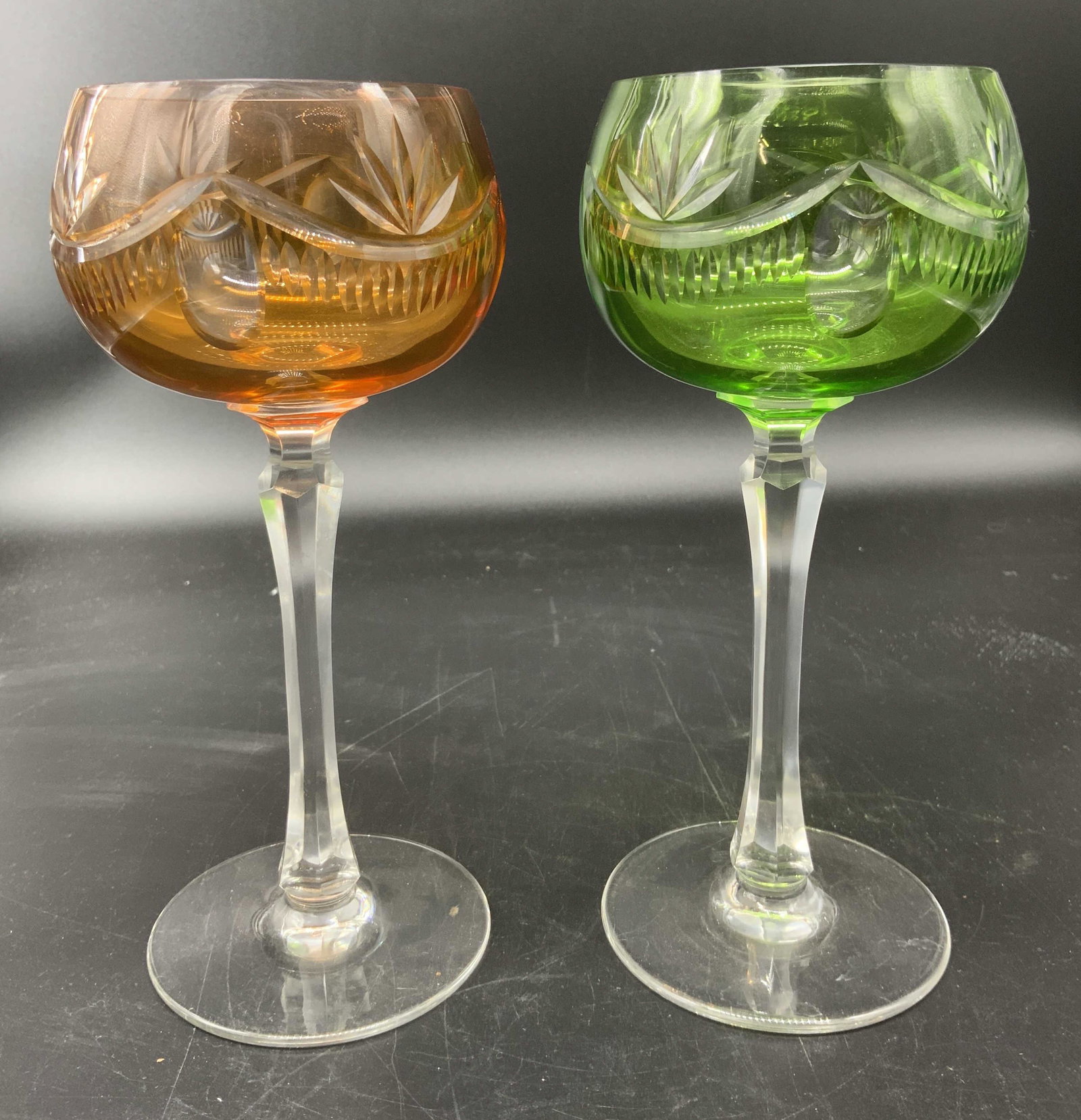 Lot 2 Bohemian Crystal Wine Glasses: Lot 2 Bohemian Crystal Wine Glasses, no apparent inscriptions or marks, both measure 7 7/8 inches tall x 3 1/4 inches in diameter at base, surface wear to pieces, minor chip to one glass, Bohemian gla