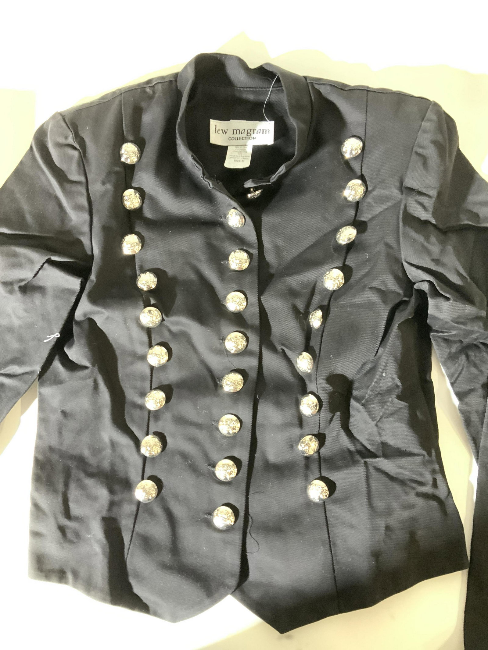 Lew Magram Combed Cotton Fashion Asian Jacket: Vintage Fitted jacket with three column of silver toned button, Asian style high collar, designer label attached, size small, app 31-32 in waist , 21 in.long , interior shoulder pad . Black Asian styl
