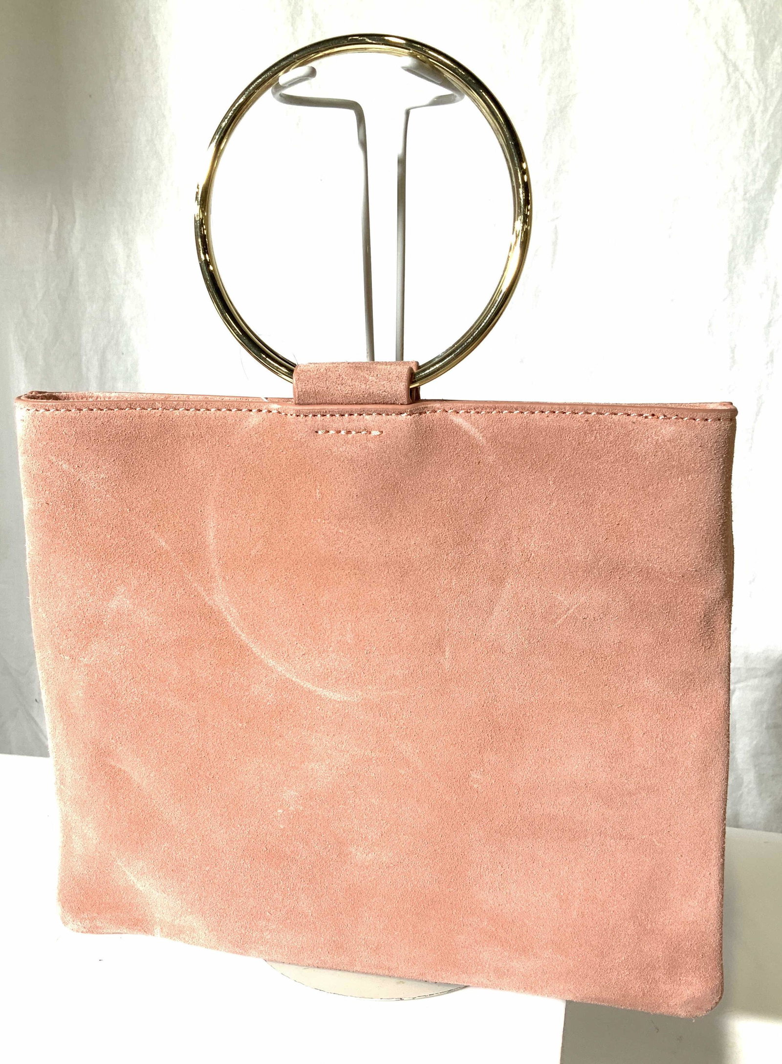 Luxe THACKER NY Minimalist Pink Suede Handbag: Modern THACKER NEW YORK hand bag and cross Body bag with detachable strap, gold tone round ring handles, magnetic clasp, inner zippered pocket. Measures 9.75 in wide, 8.5 in ht. Minor suede Scuffing, 