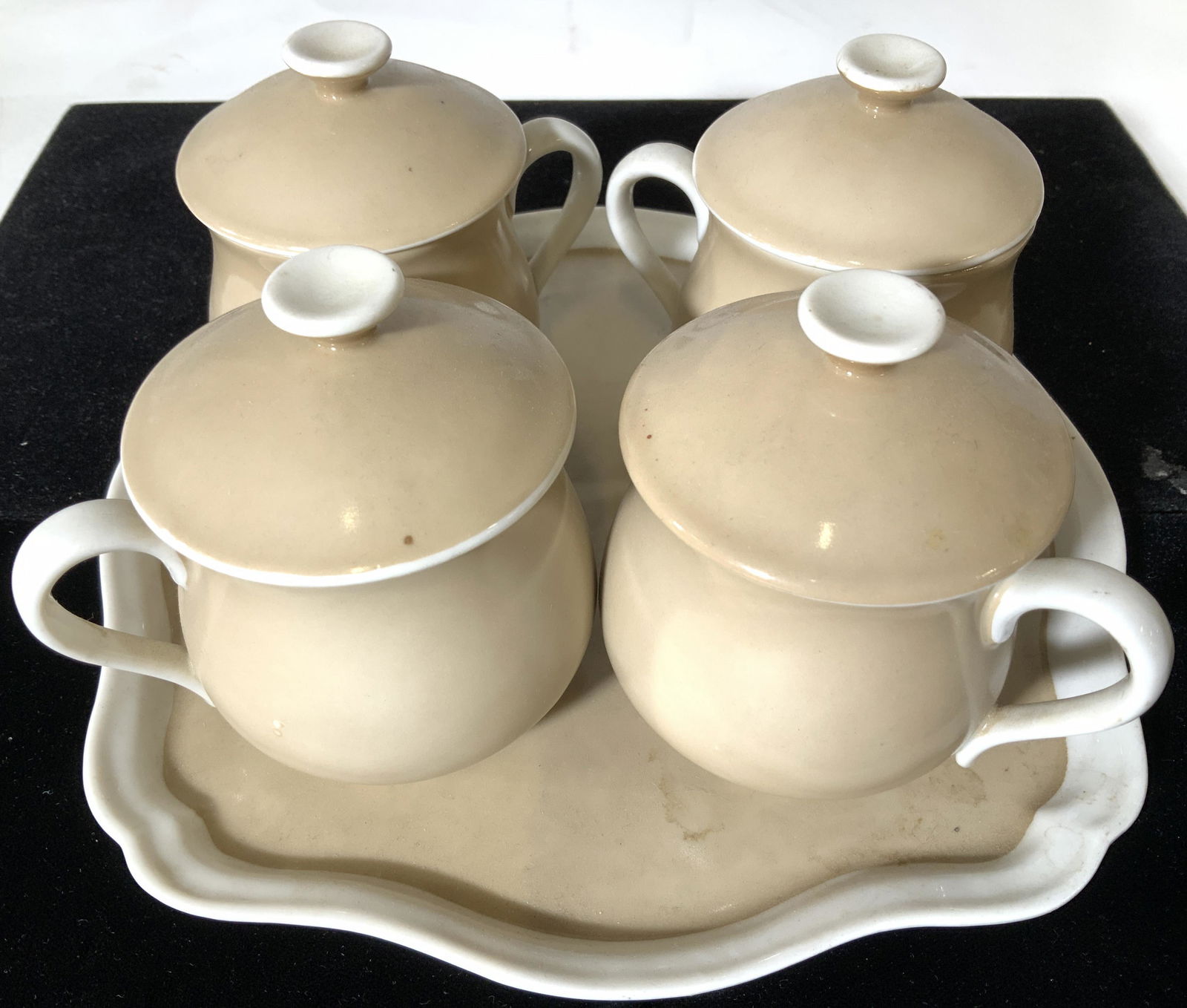 Japanese Minimalist Lidded Tea Cup Set w Tray 5: Mushroom porcelain Tea cups with lids, carry tray. Pieces marked made in Japan, vintage. Tray 8.5 in. Cups 3.5 in tall with lids. mid century Modern Japanese Porcelain Tea cups, Mushroom Minimalist Po