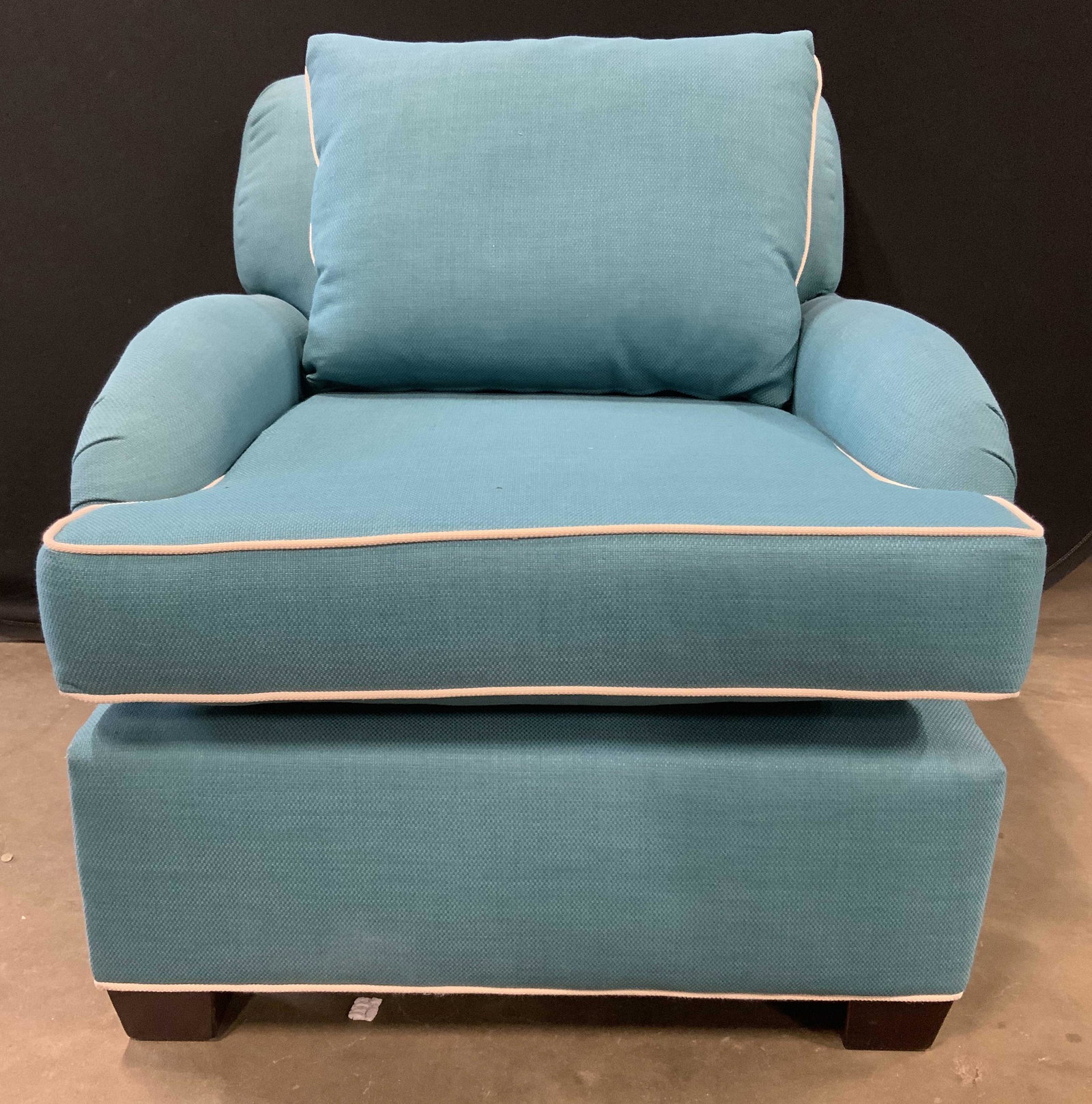 Vintage Teal & White Upholstered Armchair: Armchair appears to be vintage. Piece is teal & white toned. Chair is footed. Piece includes matching pillow. Measures approx 35 inches tall 40 inches deep 33 inches wide. Chair, armchair, upholstered