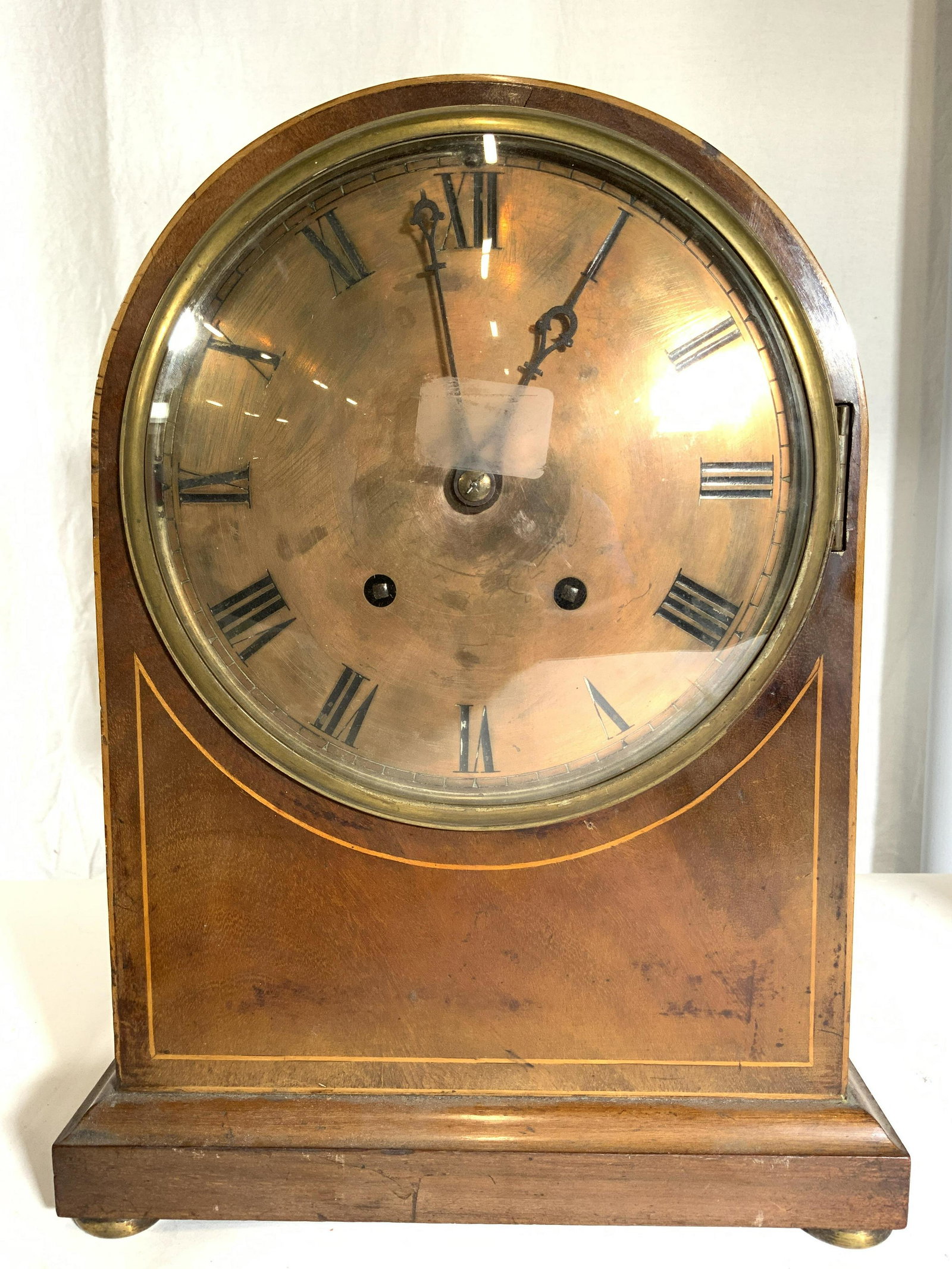 WINTERHALDER & HOFMEIER SON Vintage Mantel Clock: Interior has marking which reads W&H Son. Mantel clock appears to be wooden possibly veneer. Piece has gold toned clock face with black Roman numerals & hands. Piece measures approx 14 inches tall 10.