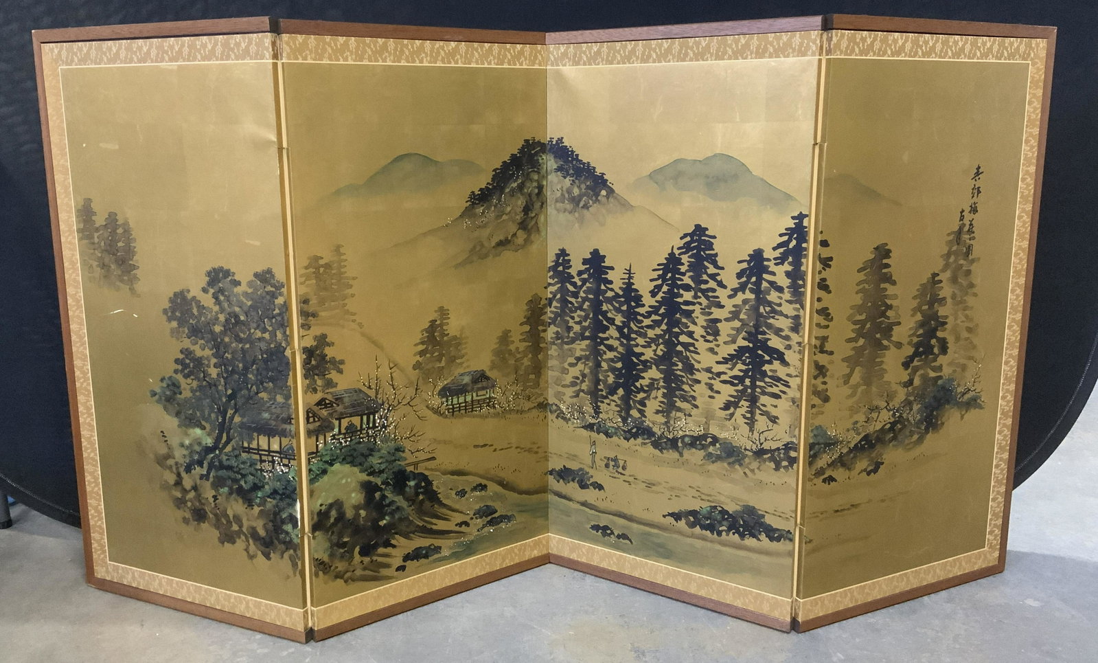 Japanese Folding Screen with Landscape: Japanese Folding Screen with Landscape, inscription to upper right in Chinese characters, label reads ‘Made in Japan’, measures 36 inches tall x 70 1/2 inches, subject figures working in front of 
