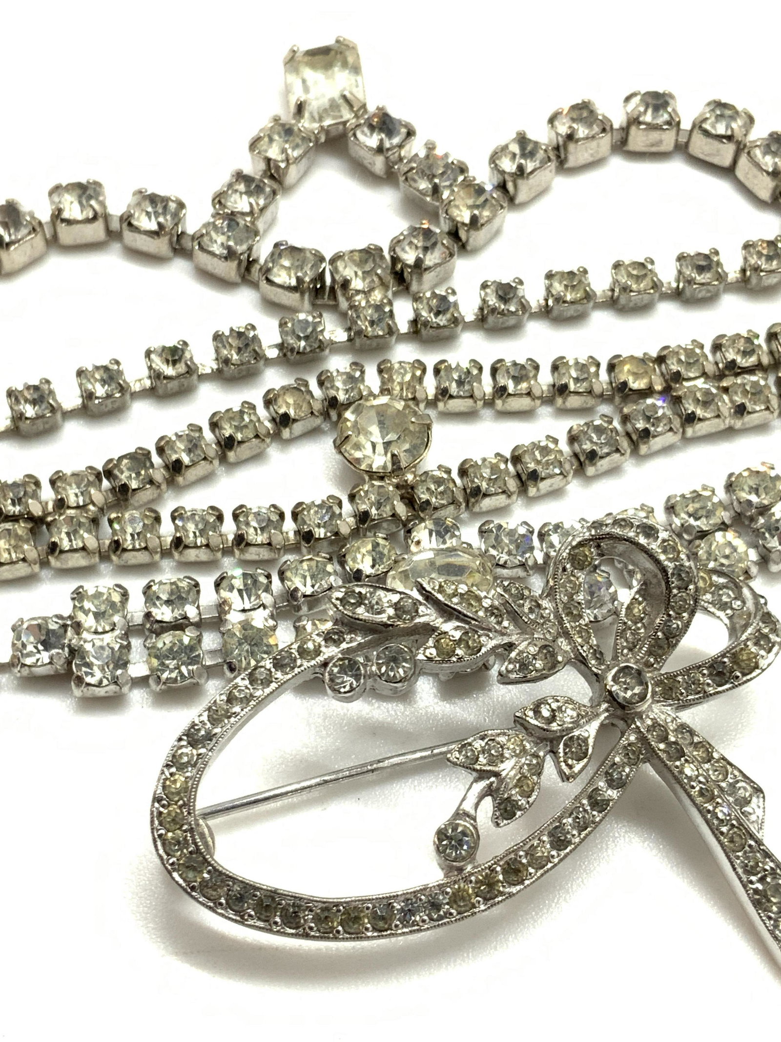 Lot4 Vntg Bridal Style Jewelry, Necklaces and more: Four pieces of, possibly vintage, jewelry that can be worn together or separately. Each piece is crafted from silver tone metal and covered in faceted, colorless rhinestones. There are two bracelets, 