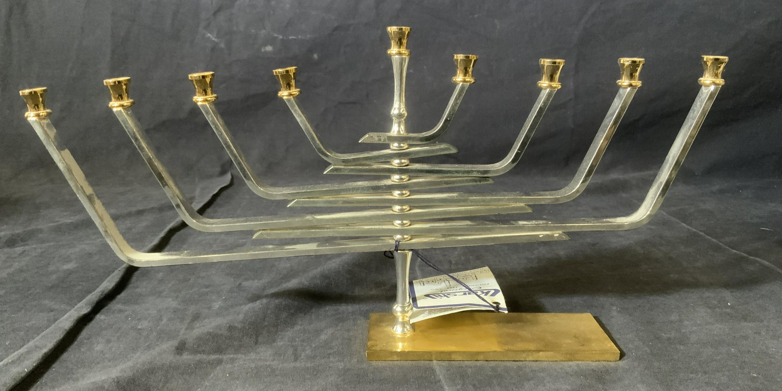 KARSHI 24kt Gold & Silver Plated Menorah: KARSHI 24kt Gold & Silver Plated Menorah, inscription reads ‘Karshi Original Founded 1955’, measures 6 3/8 inches tall x 10 1/2 inches, surface wear to piece, KARSHI, 24 karat gold, silver plate, 