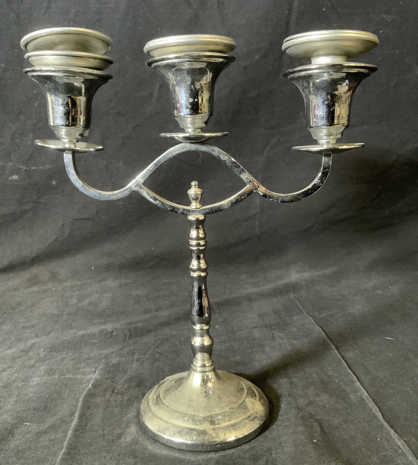CROMWELL SILVER CORP Chromium Candelabra: CROMWELL SILVER CORP Chromium Candelabra, inscription reads ‘Cromwell Silver Mfg Corp Chromium’, measures 11 1/4 inches tall x 9 1/2 inches at widest point, surface wear and minor rusting to piece