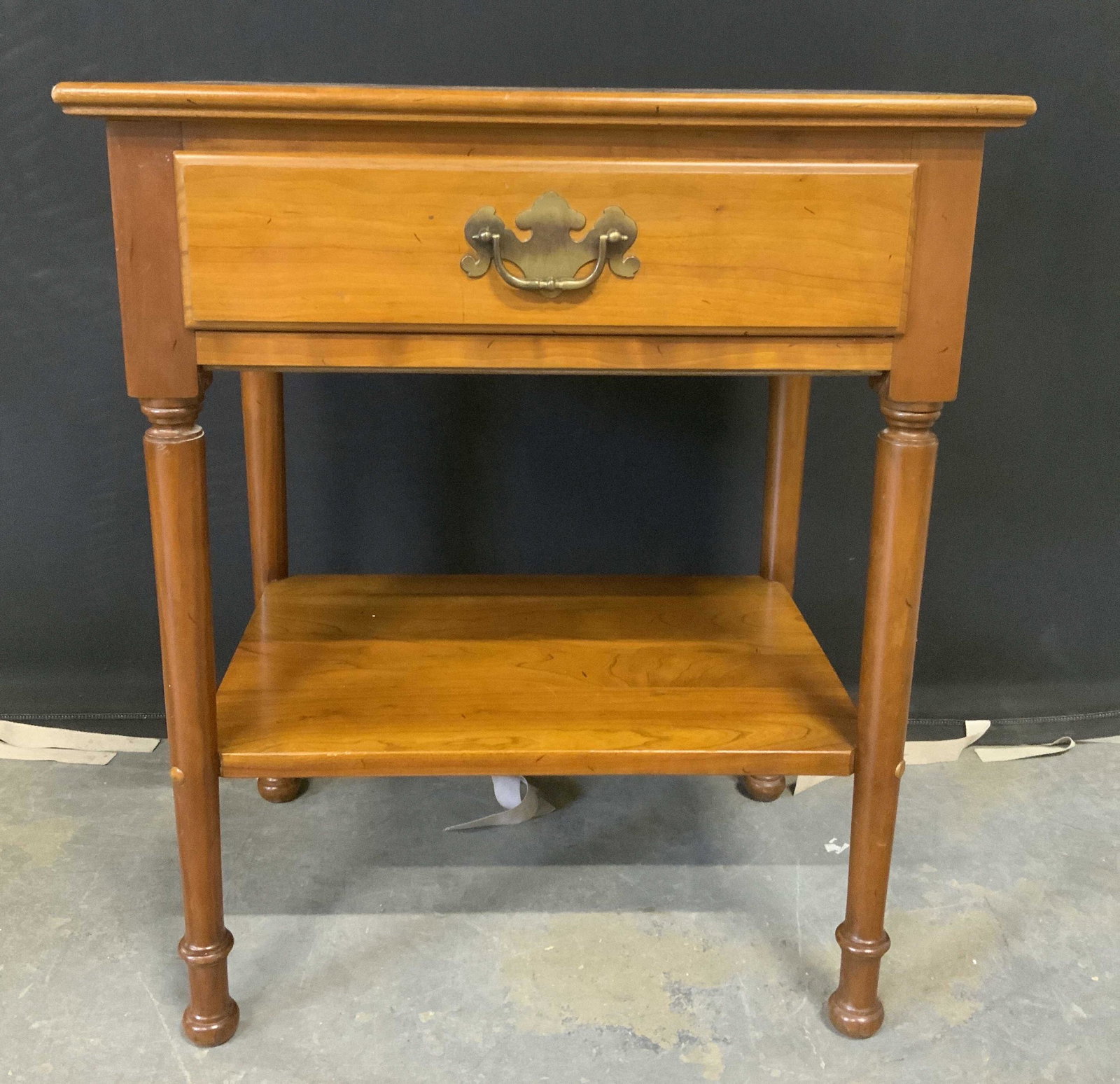 Vintage STICKLEY Wooden Nightstand: Vintage wooden nightstand. Inside of drawer is marked STICKLEY FAYETTEVILLE, houses one drawer and a cabinet. Measures approx 26 inches H, 22 inches W, and 16 inches deep. Wear is consistent with age 