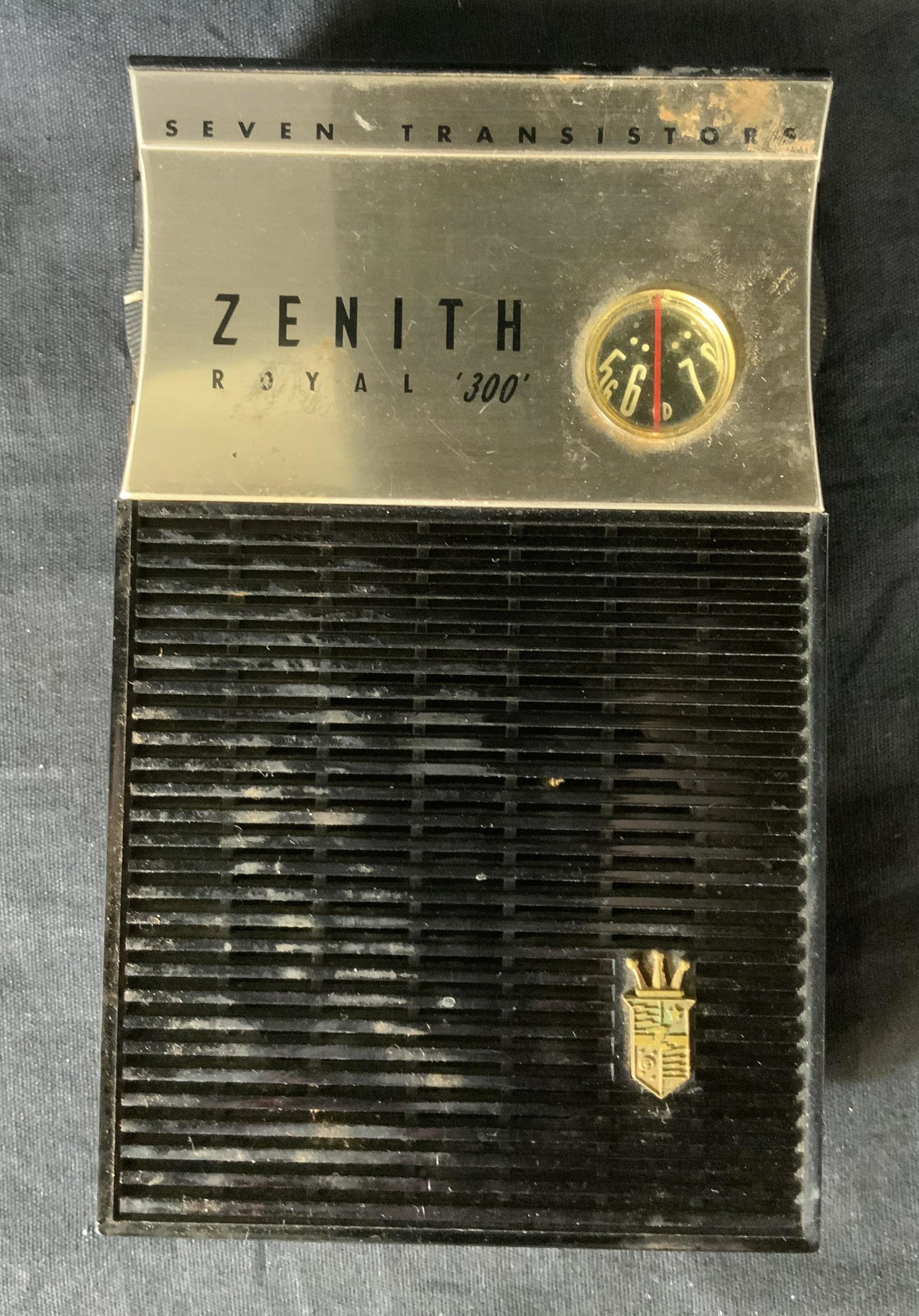 Vintage 1950’s ZENITH Royal 300 Radio: Vintage 1950’s ZENITH Royal 300 Radio, inscriptions read ‘Seven Transistors Zenith Royal 300 Tubeless 7Transistors’, measures 5 3/4 x 3 1/2 inches, surface wear to piece, not tested for function