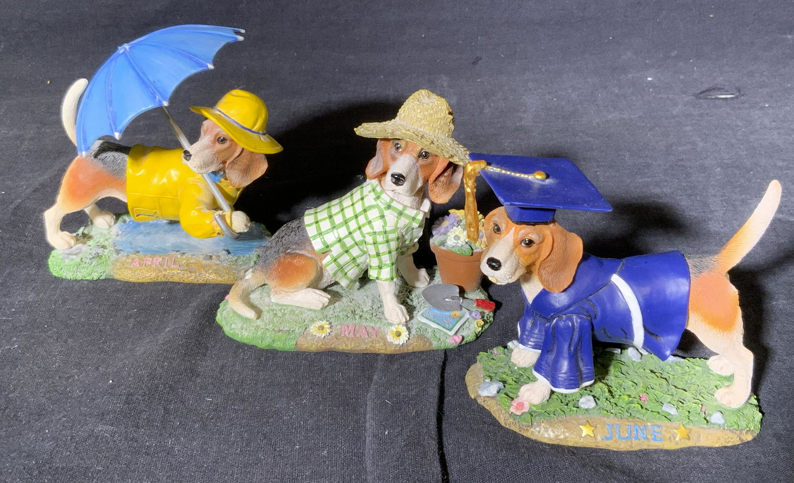 DANBURY MINT 3 Dog Calendar Beagle Figurines: Danbury Mint 3 Dog Calendar Beagle Figurines, underside of each reads ‘The Danbury Mint MBI Made in China’ along with the figures corresponding month, lot features the months: April May and June,