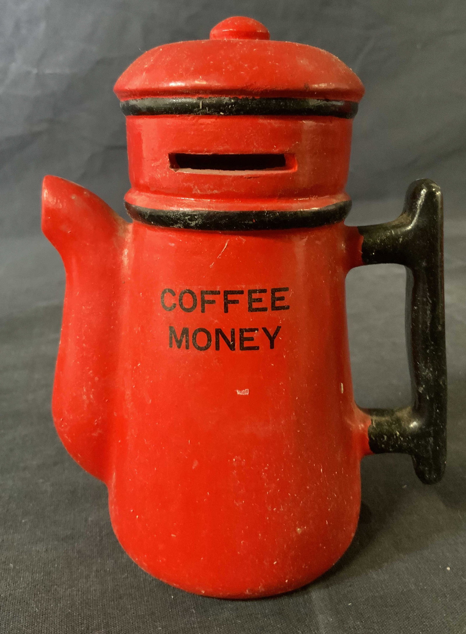 Coffee Pot Shaped Coin Bank: Coffee Pot Shaped Coin Bank, inscriptions read ‘Coffee Money’ and ‘Taiwan’, measures 6 inches tall x 4 5/8 inches at widest point, some surface wear to piece, Property of multi generation Broo