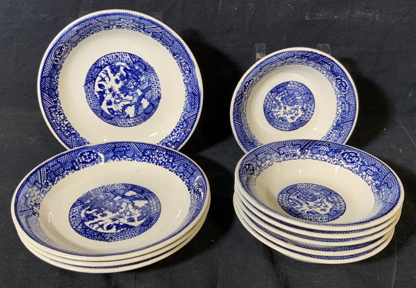 Asian Porcelain Group Lot 6 Bowls & 4 Dishes: Asian porcelain group lot of 6 bowls and 4 dishes, no apparent inscriptions or markings, surface of each piece is designed with various Asian garden and architectural scenes, bowls measure 1.75 inches