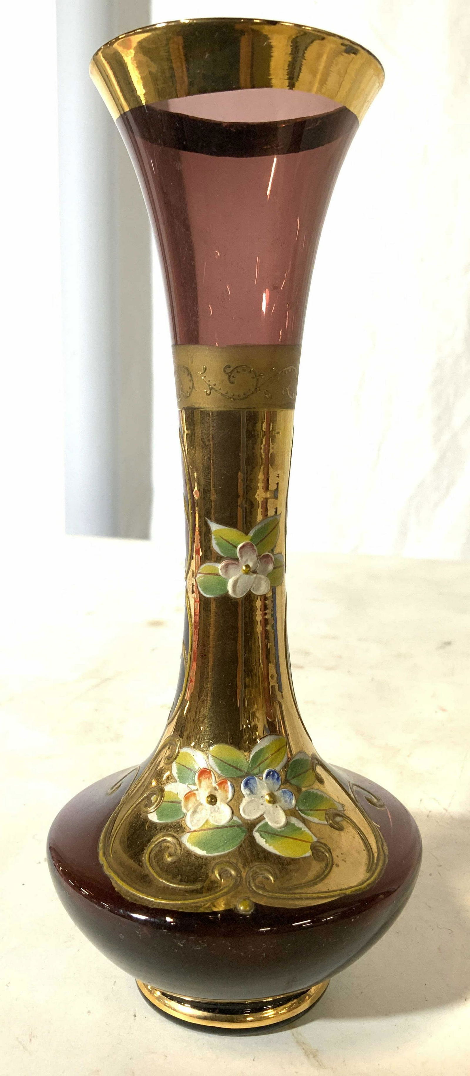 Vintage Bohemian Glass Art Glass Vase: Vase is vintage. Piece has gold toned areas with multi toned hand painted floral and leaf detail. Vase Rim is gold toned. Piece measures approx 8 inches tall 3.5 inches wide. Vase, Art glass, Art Glas